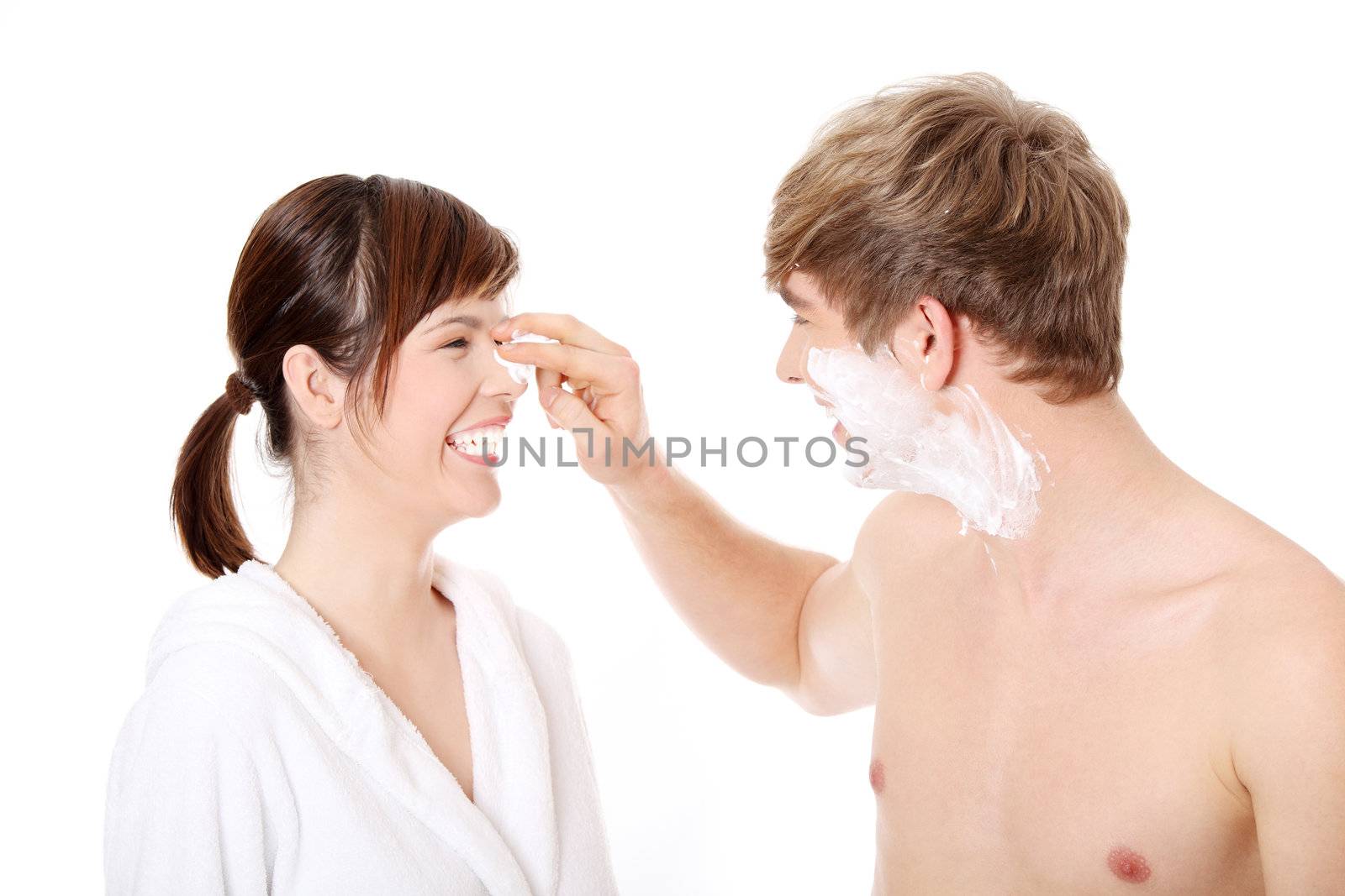 Young couple in bathroom, isolated on white