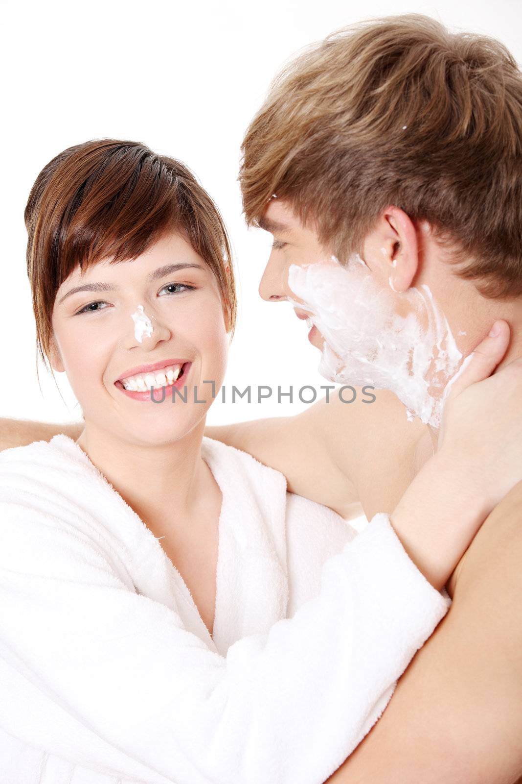 Young couple in bathroom, isolated on white