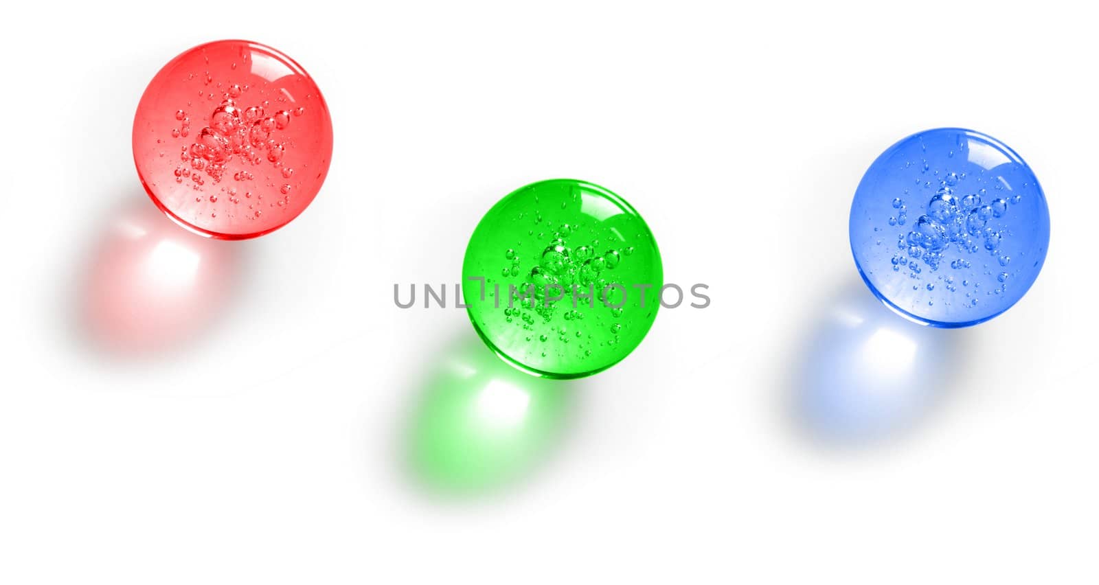 Three color glass balls with bubbles inside