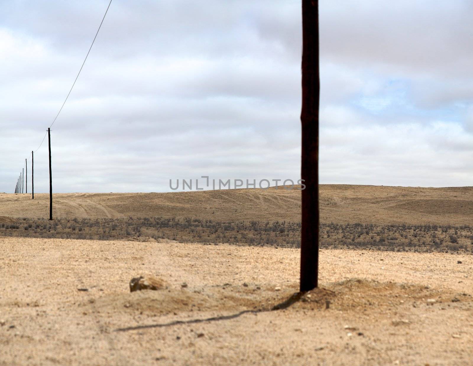Arid and desolate landscape in Namibia on the way to Swakopmund