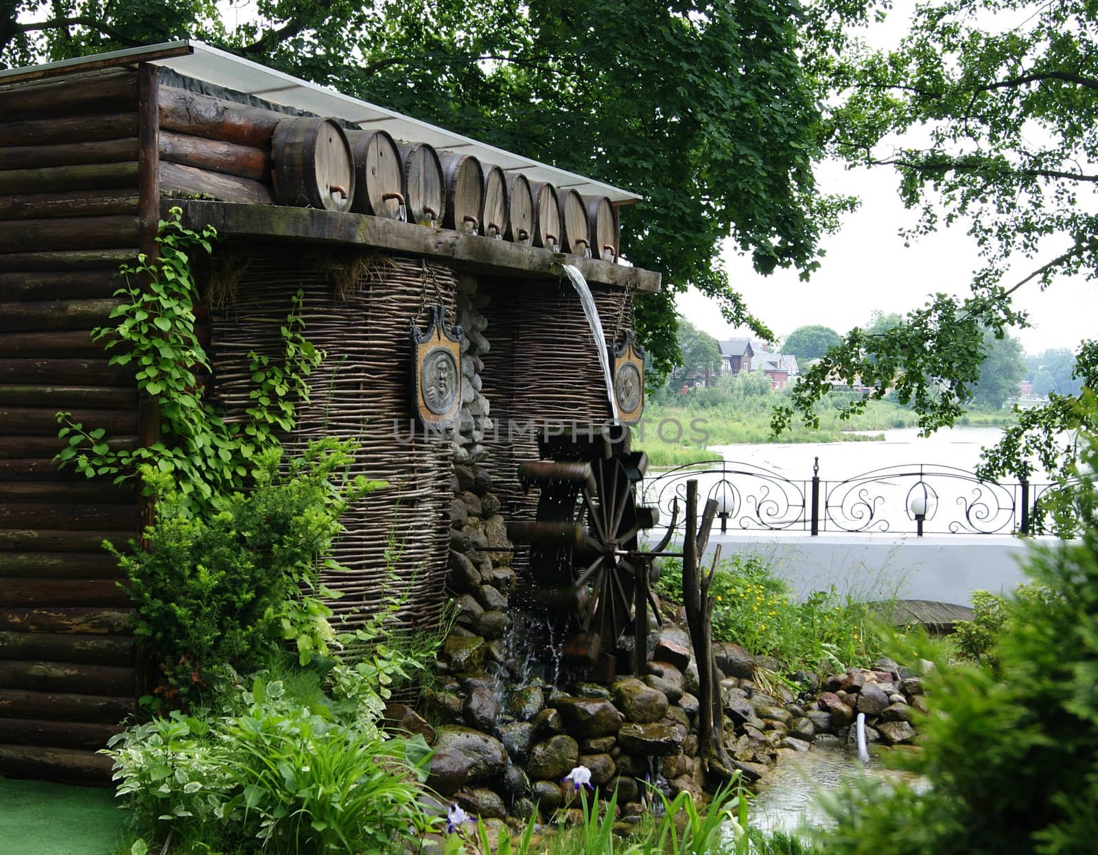 The decorative watermill is used as an interior. Modern construction