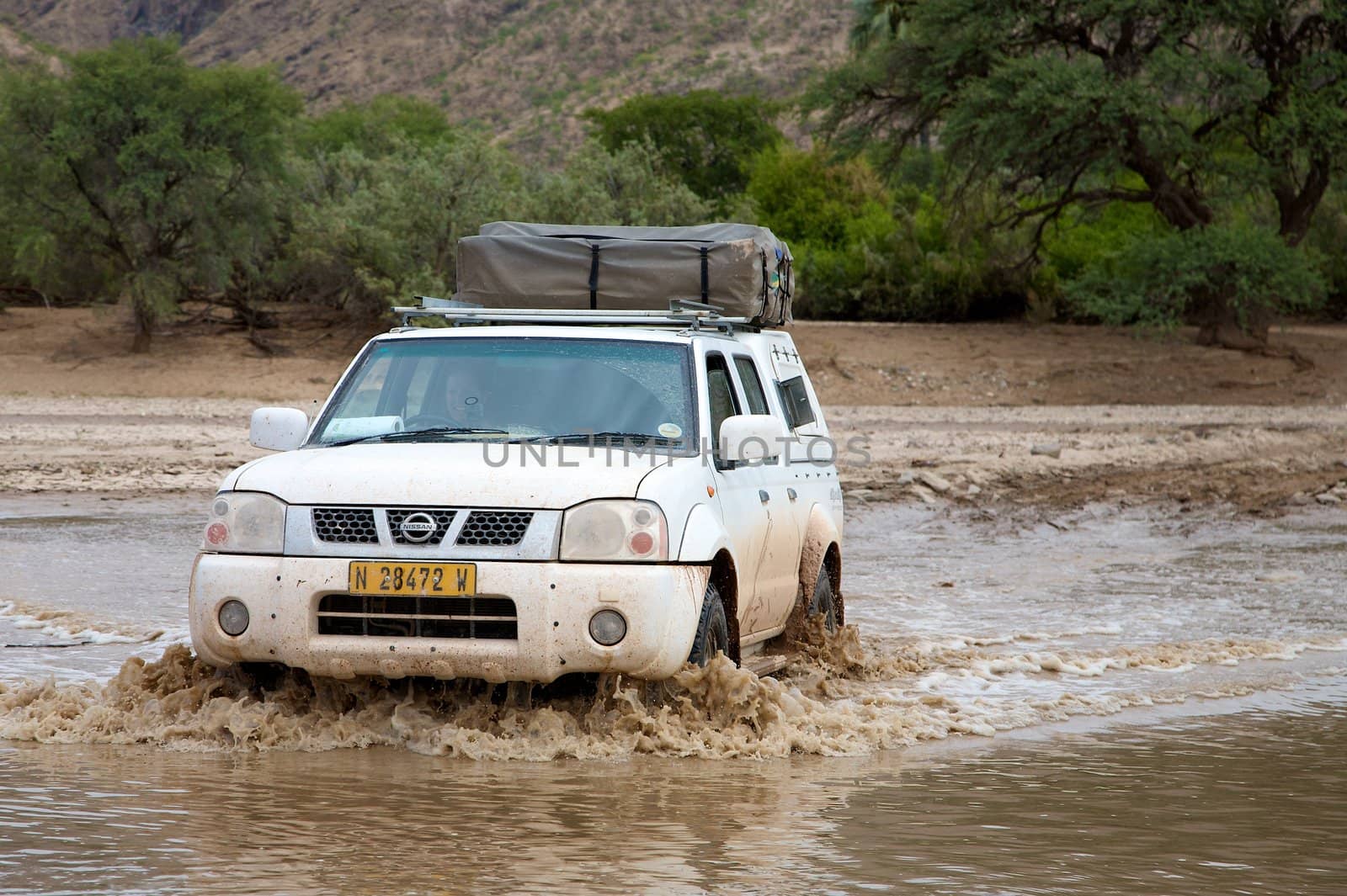 Crossing of a river by 4x4 in Namibia - Kaokoland
