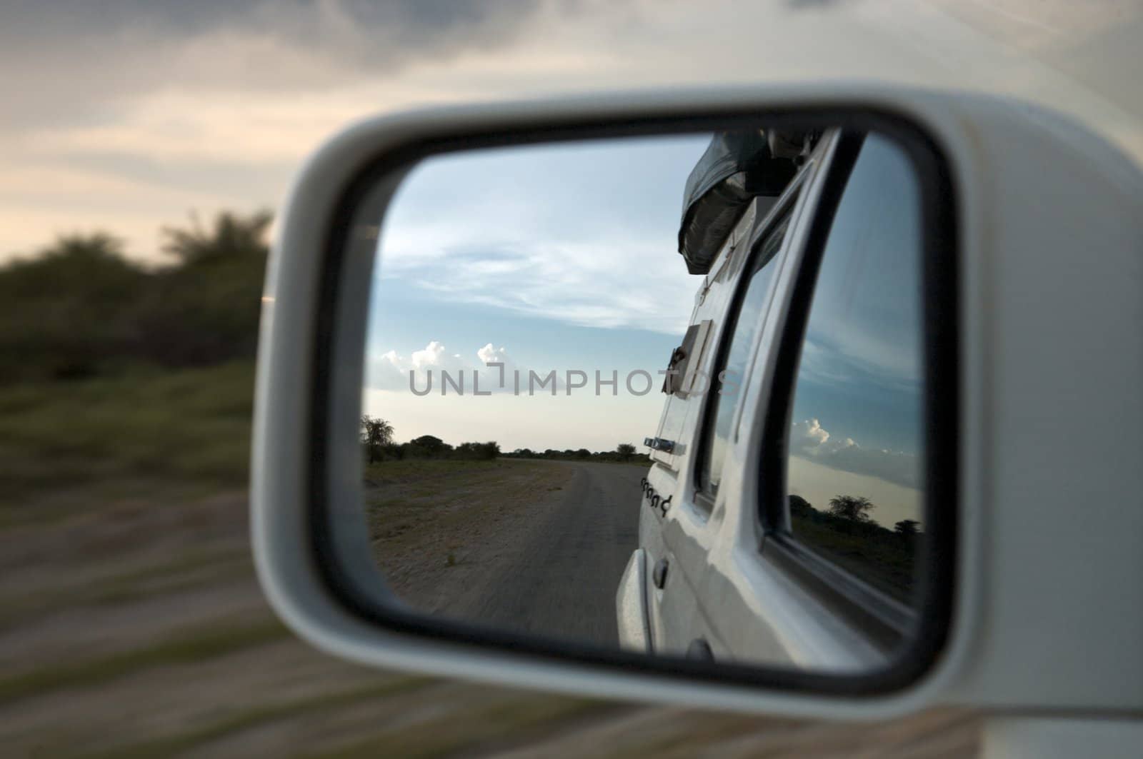 Mirror and african view while driving in Nambia - Kaokoland