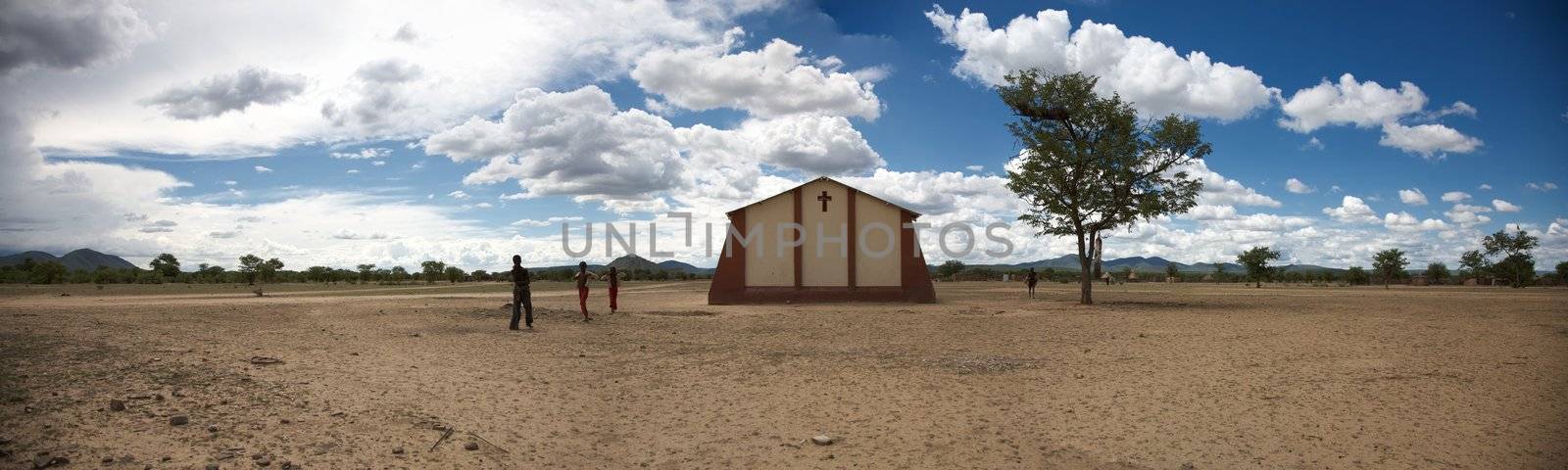 Panoramic view of a village in Namibia with the church in the middle of the photo