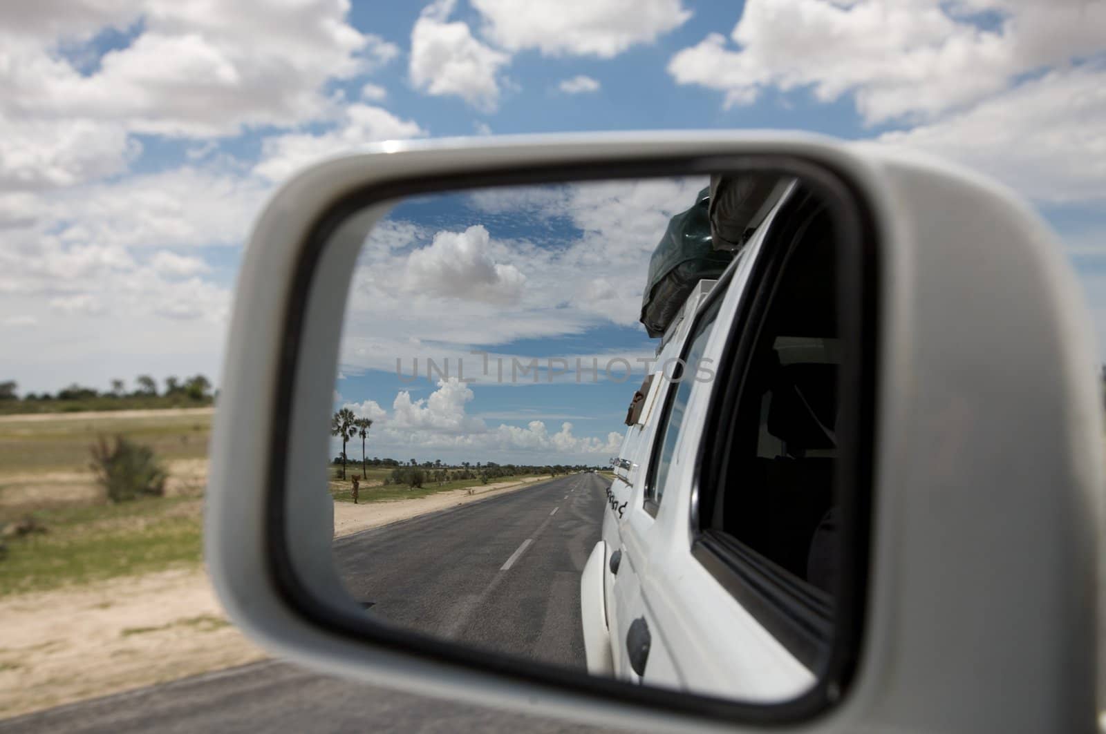 Mirror and african view while driving in Nambia - Kaokoland