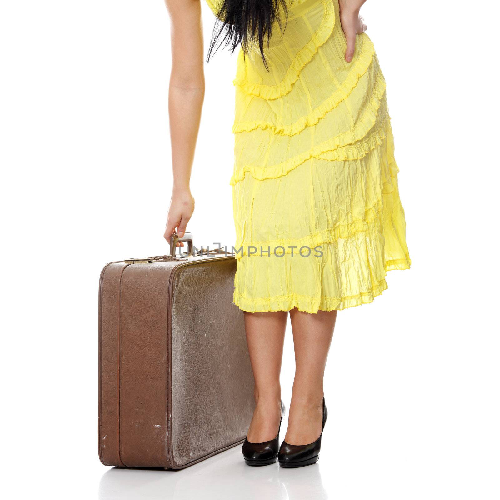 Caucasian woman legs with travel case by BDS