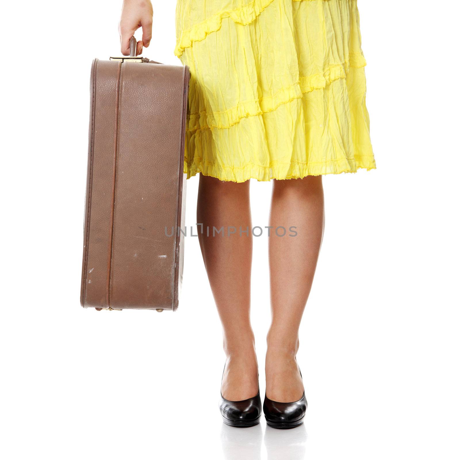 Caucasian woman legs with travel case by BDS