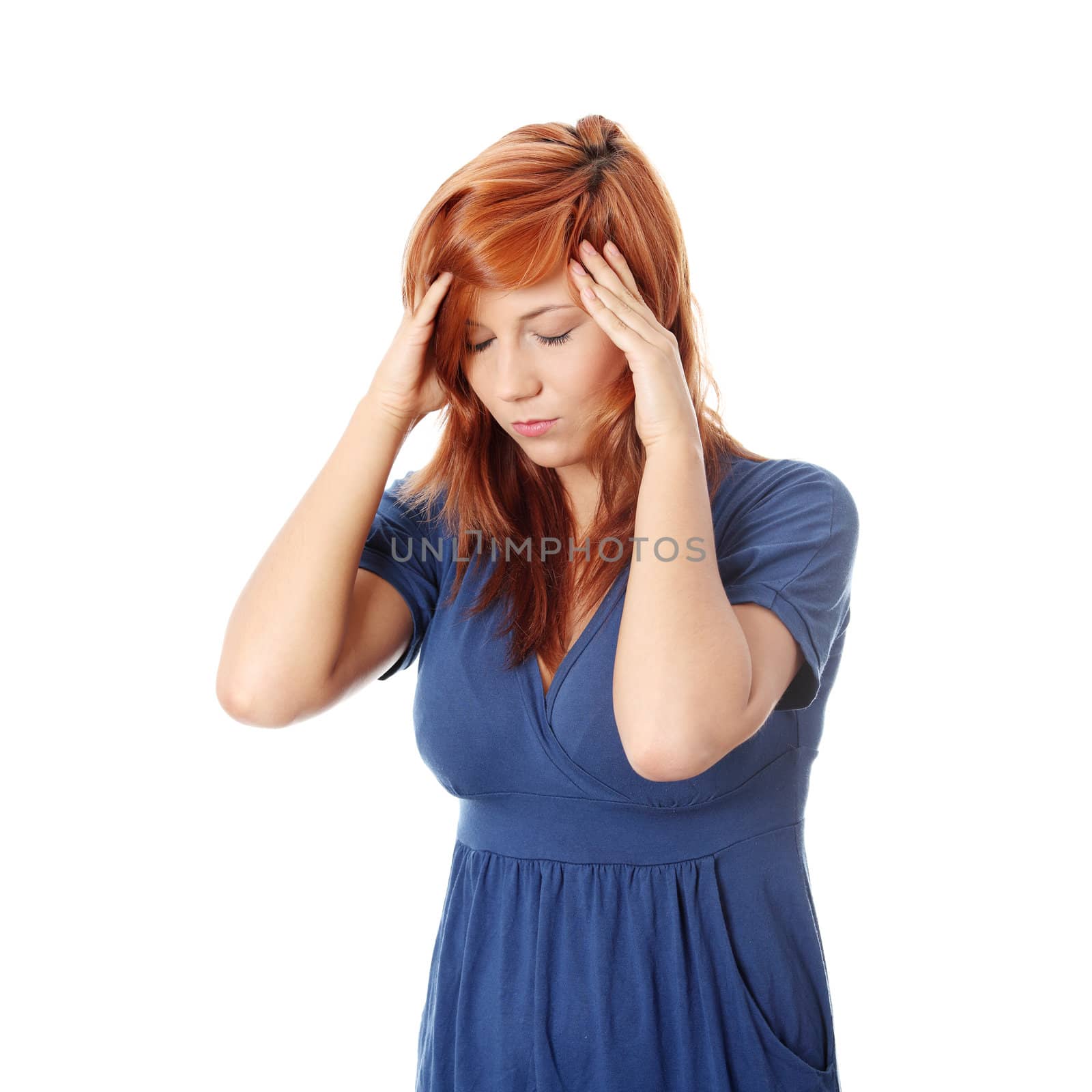 Woman with headache holding her hand to the head by BDS