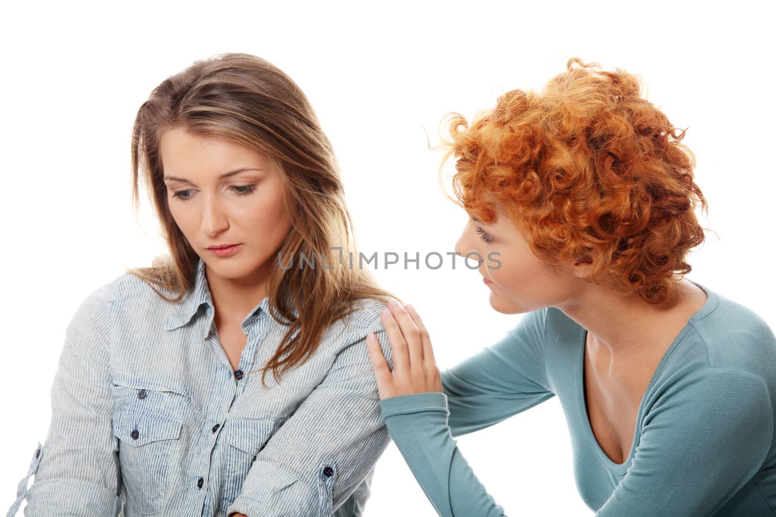 Troubled young girl comforted by her friend by BDS