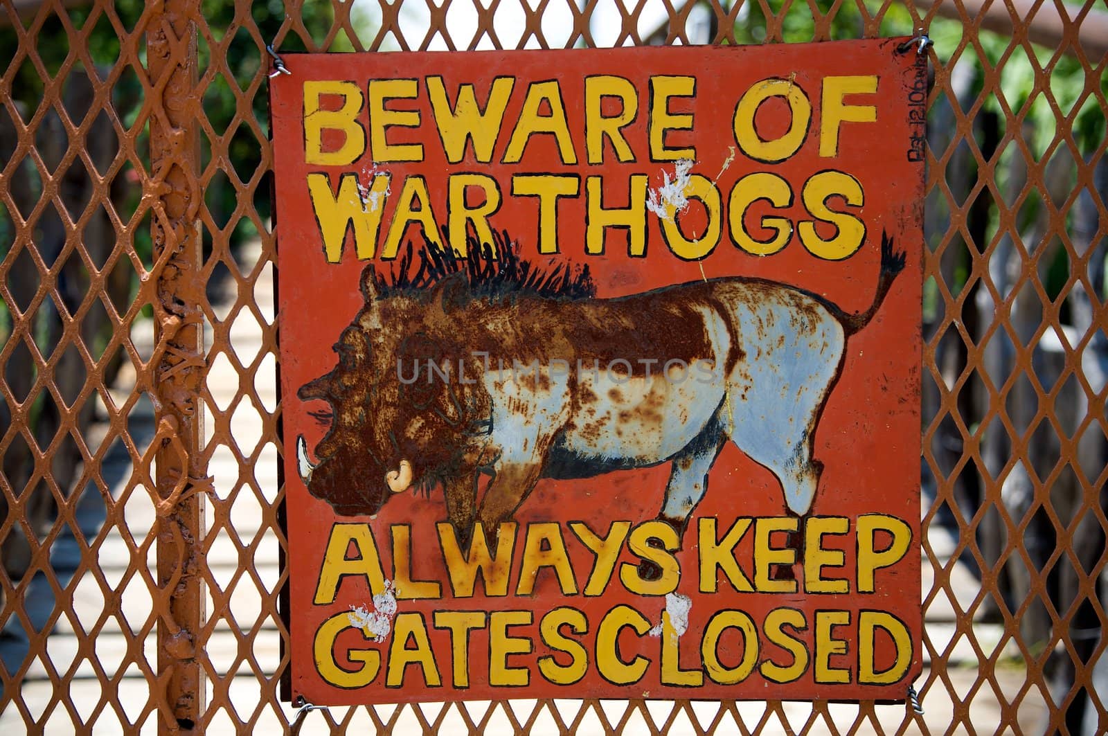 Beware of warthogs signboard in Harnas foundation