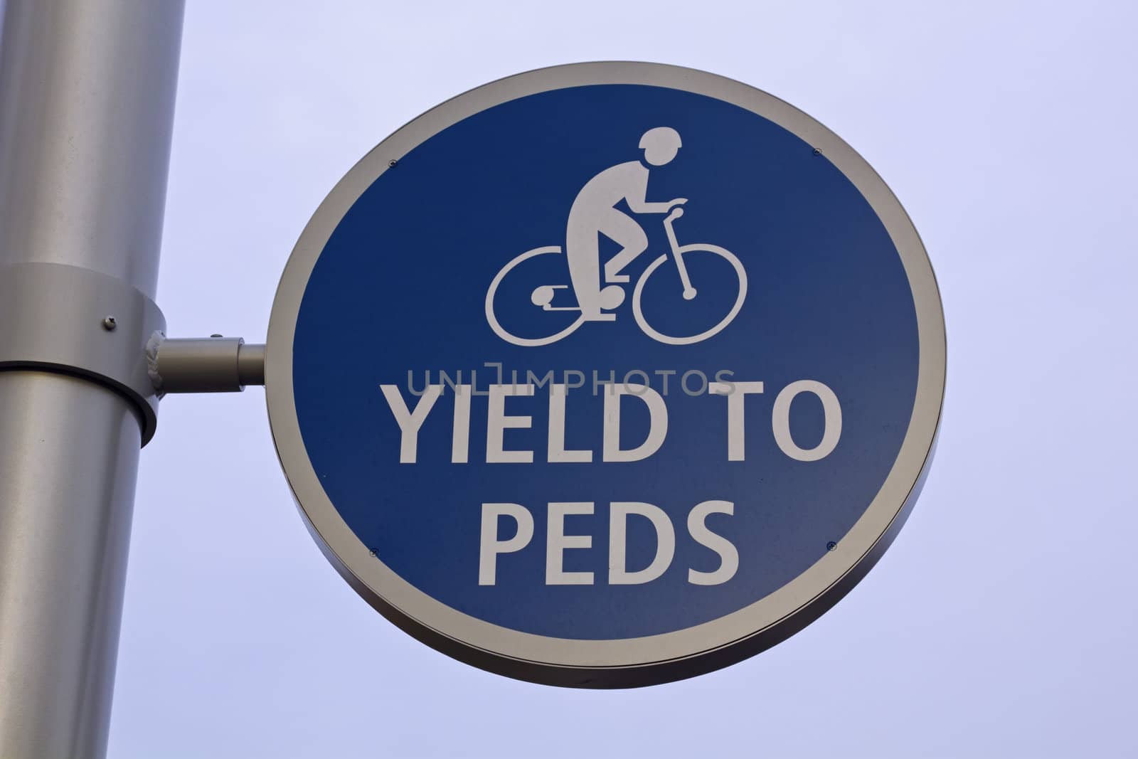Yield to peds road sign