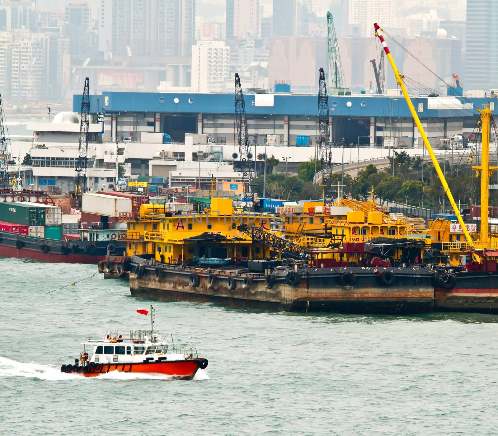 A boat is approaching the deck that is under construction