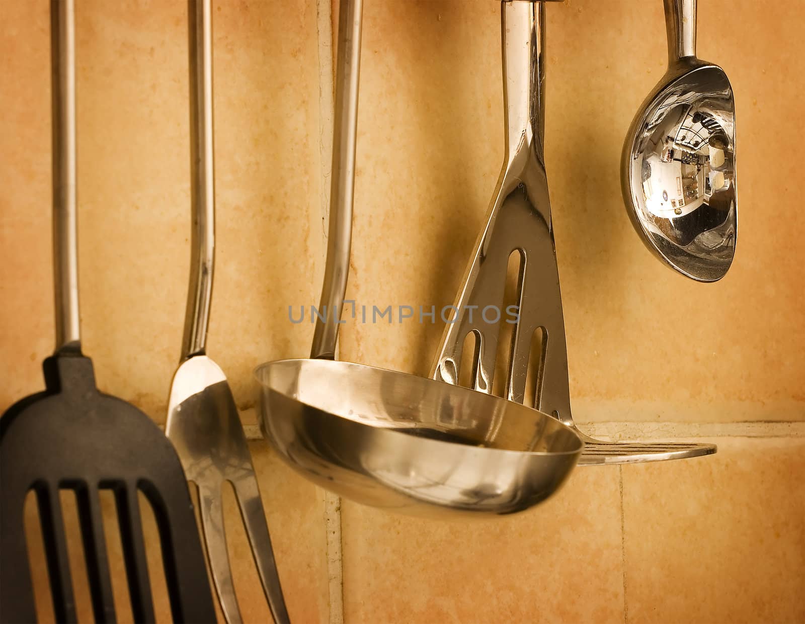 Set of tools hanging on the kitchen wall