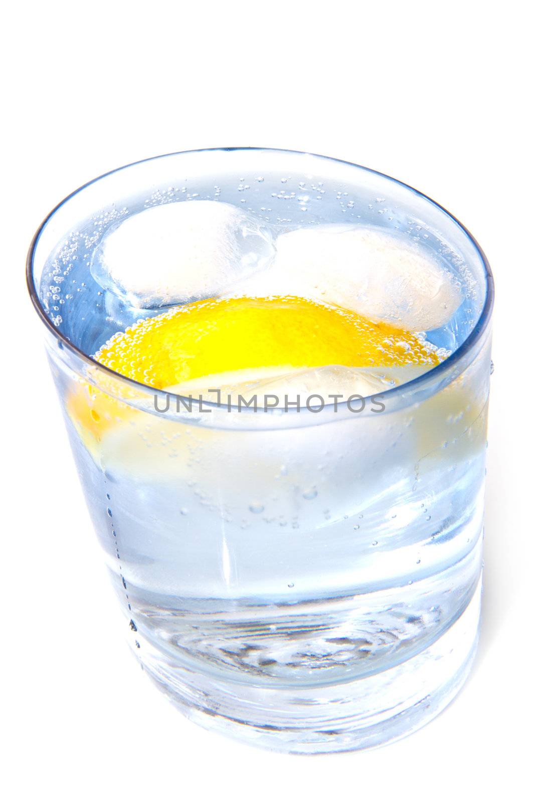 Water glass with ice & lemon isolated on white 