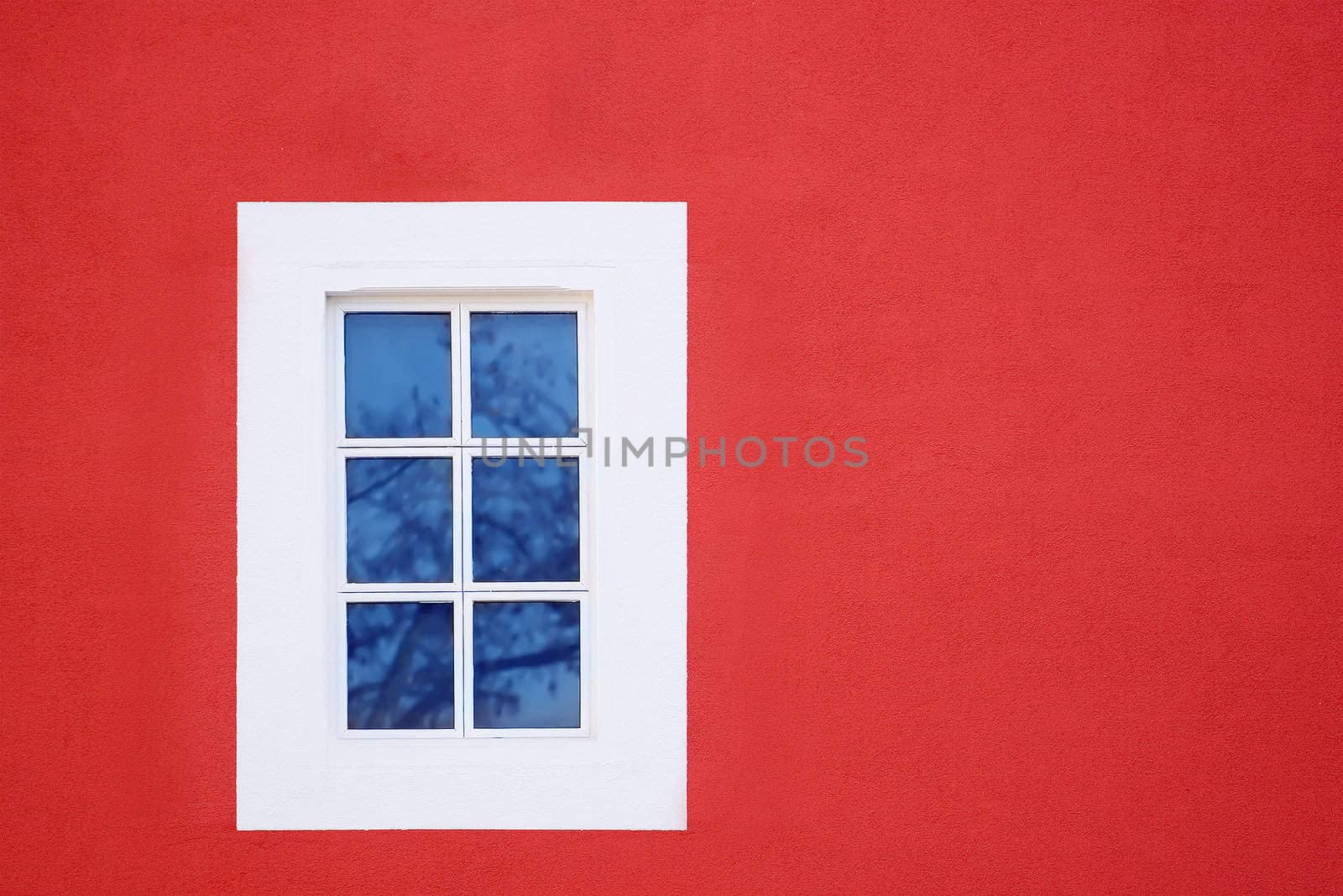 Window on the red modern house ,a  lot of space for your text on the side