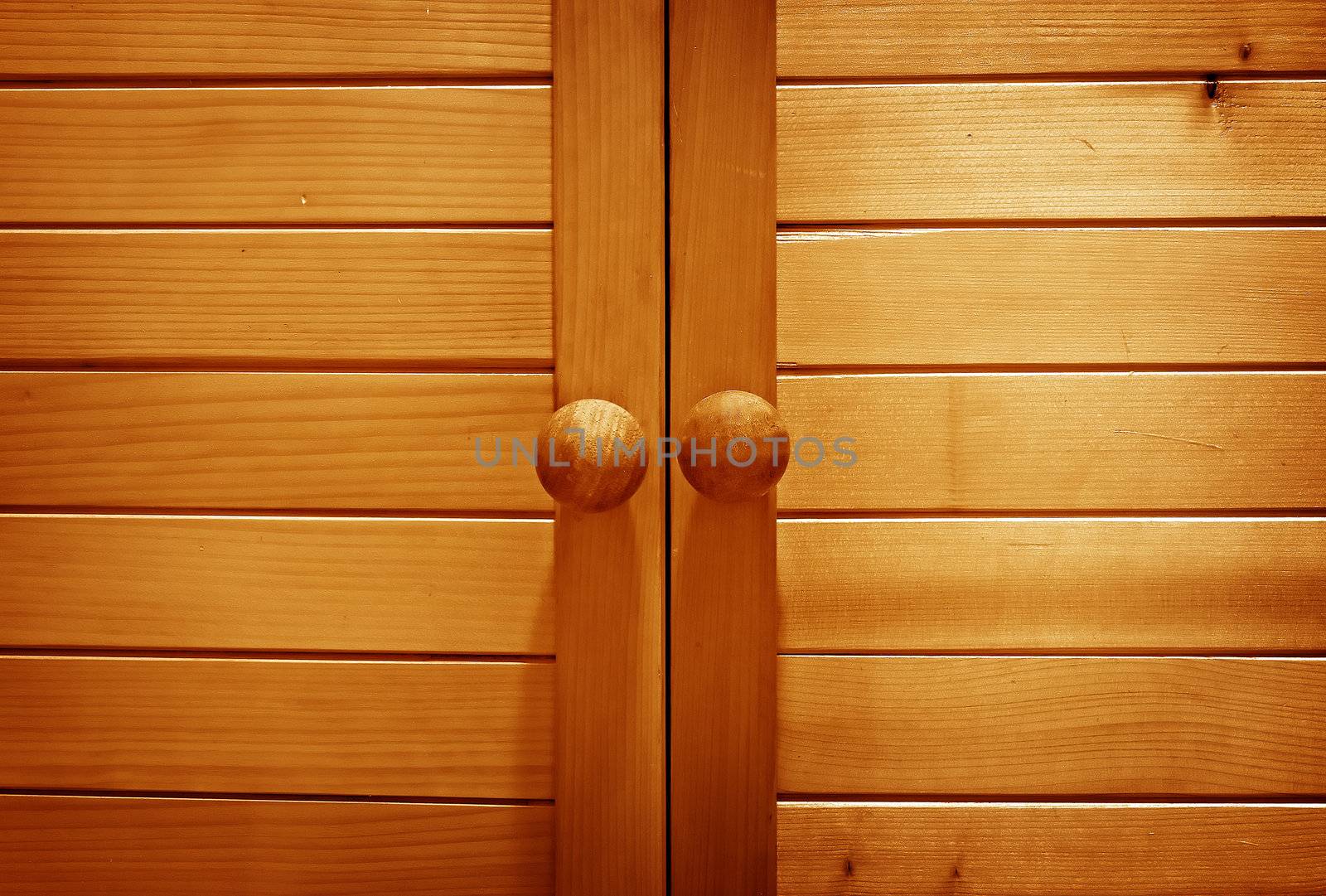 Old wooden wardrobe doors close up