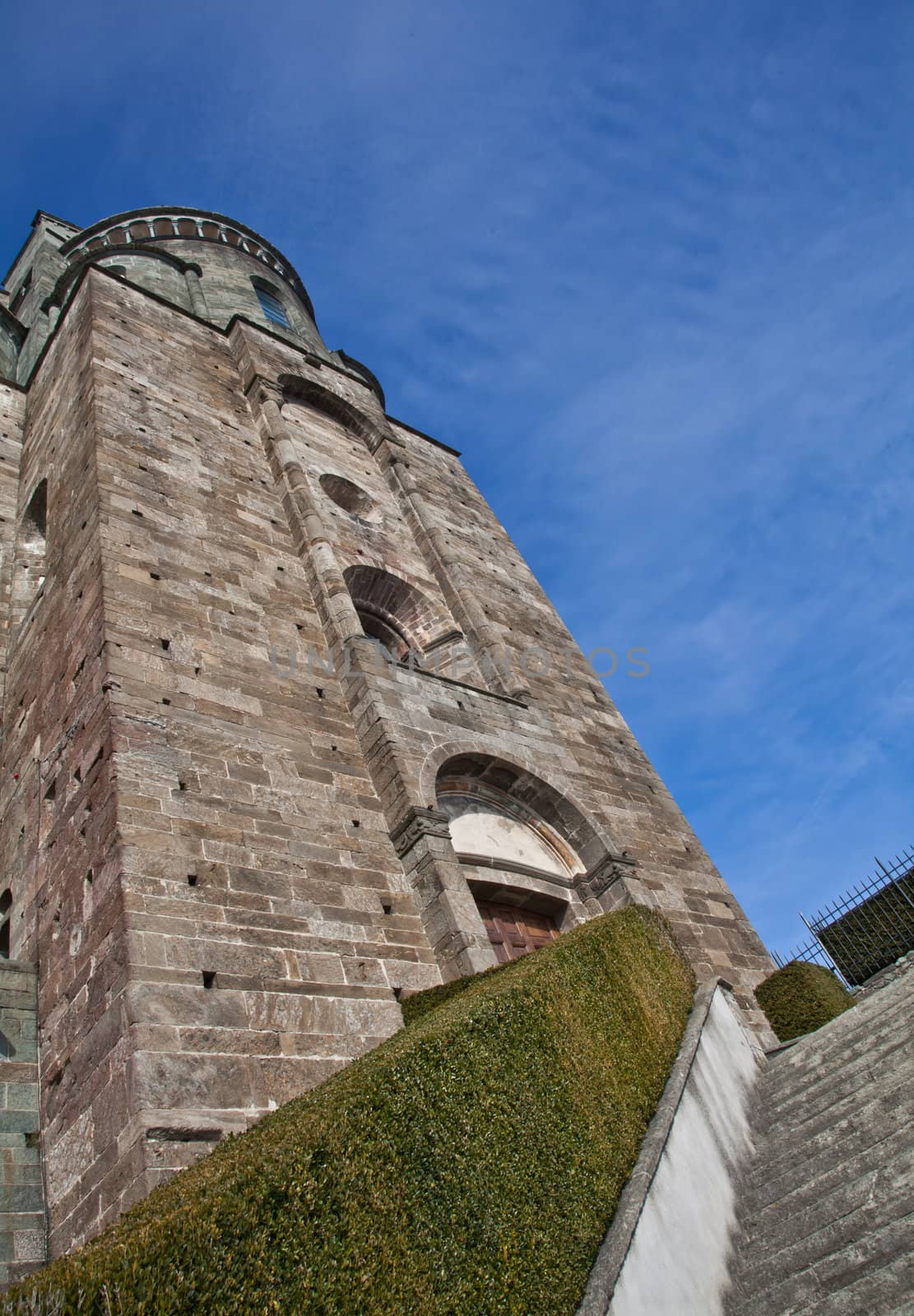 Abbey of 11st century, Piedmont region, Italy. The church, whose construction lasted for many years, is characterized by the unusual position and architecture.