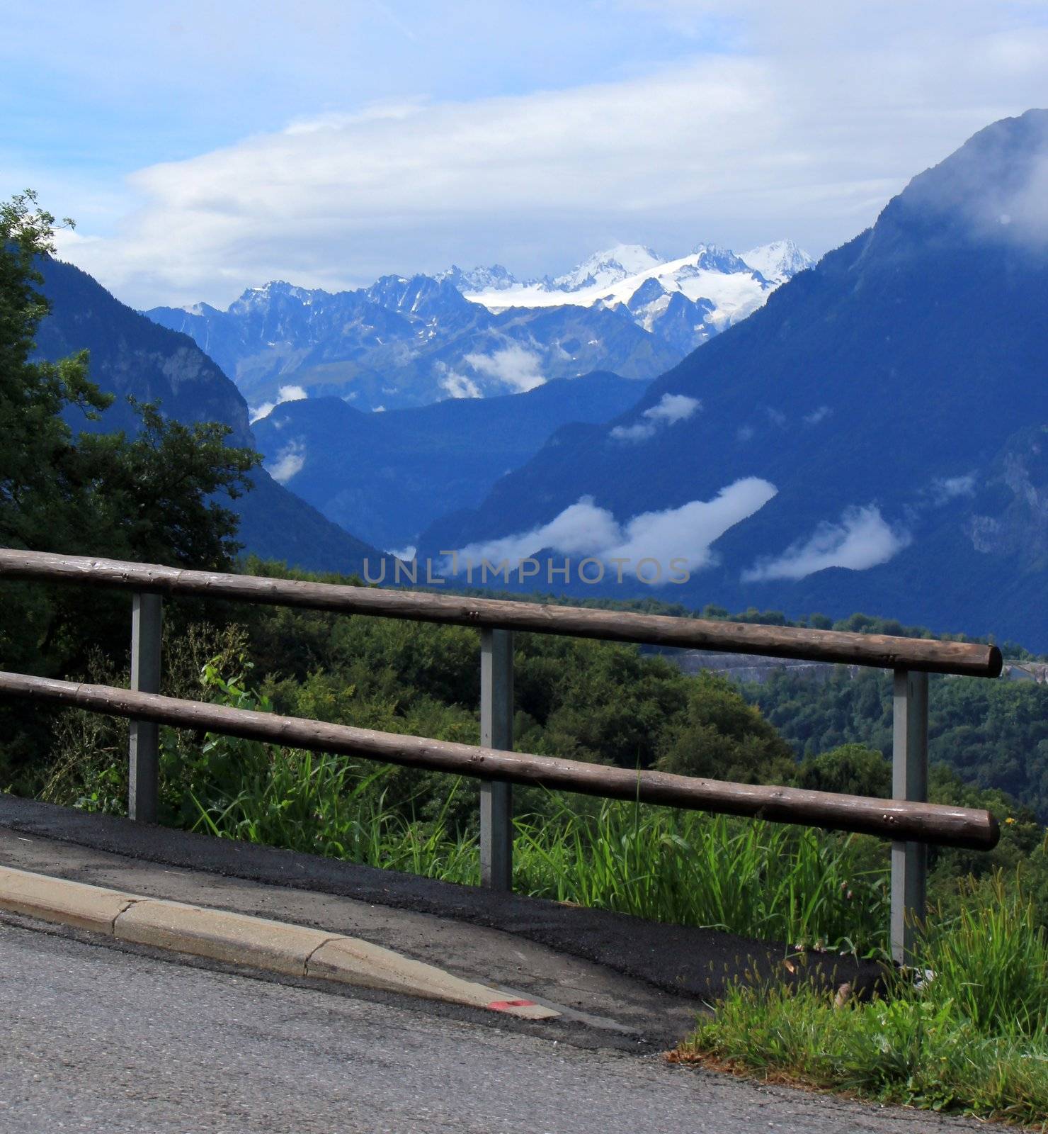 Road and Alps mountain, Switzerland by Elenaphotos21