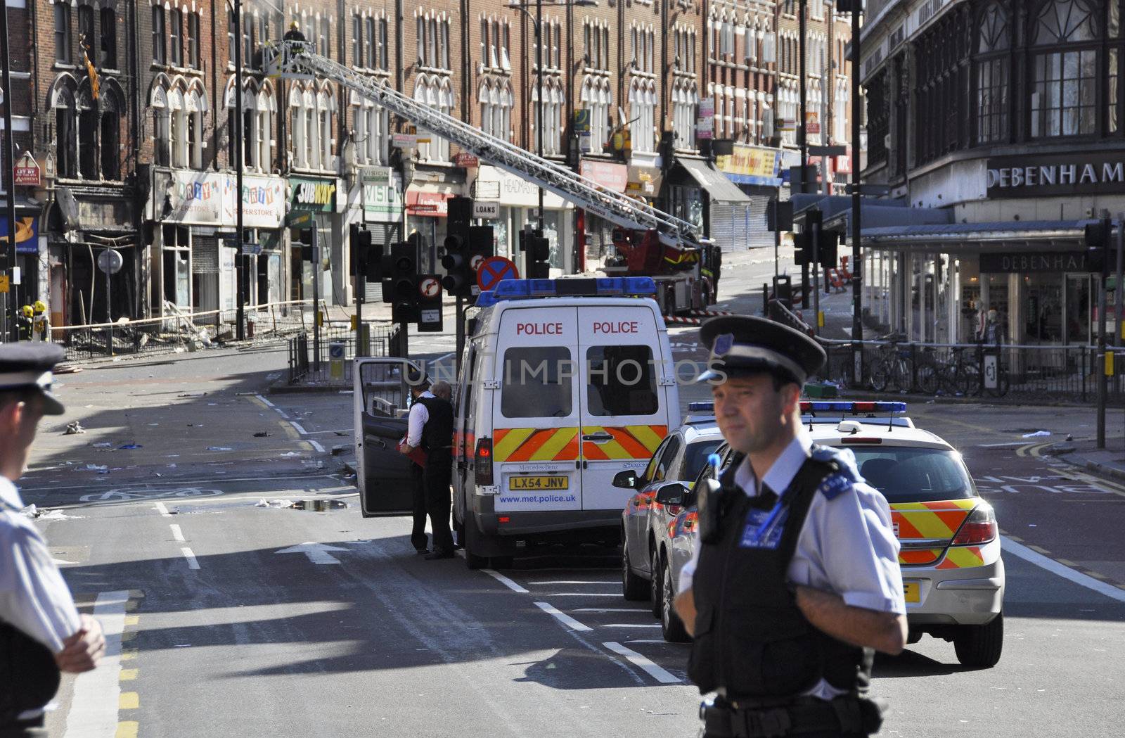 LONDON - AUGUST 09: Clapham Junction area is sacked after the third night of riots, on August 09, 2011 in London. Riots start spreading in London after Mark Duggan was shot dead by the police.