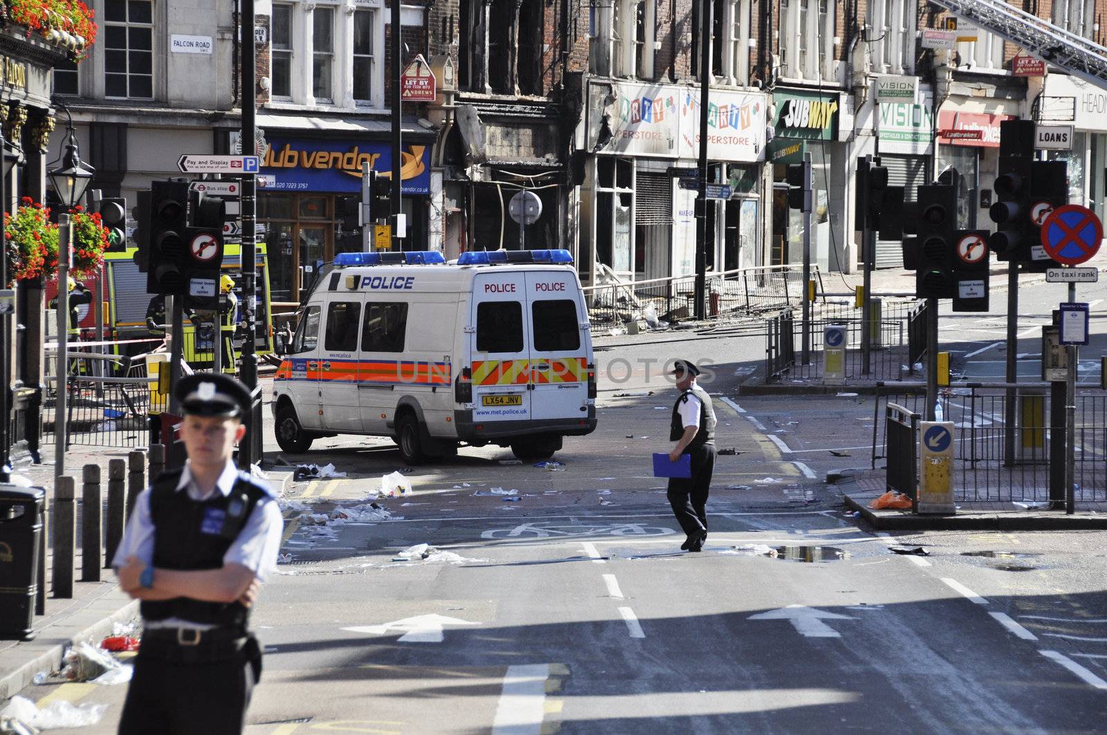 LONDON - AUGUST 09: Clapham Junction area is sacked after the third night of riots, on August 09, 2011 in London. Riots start spreading in London after Mark Duggan was shot dead by the police.