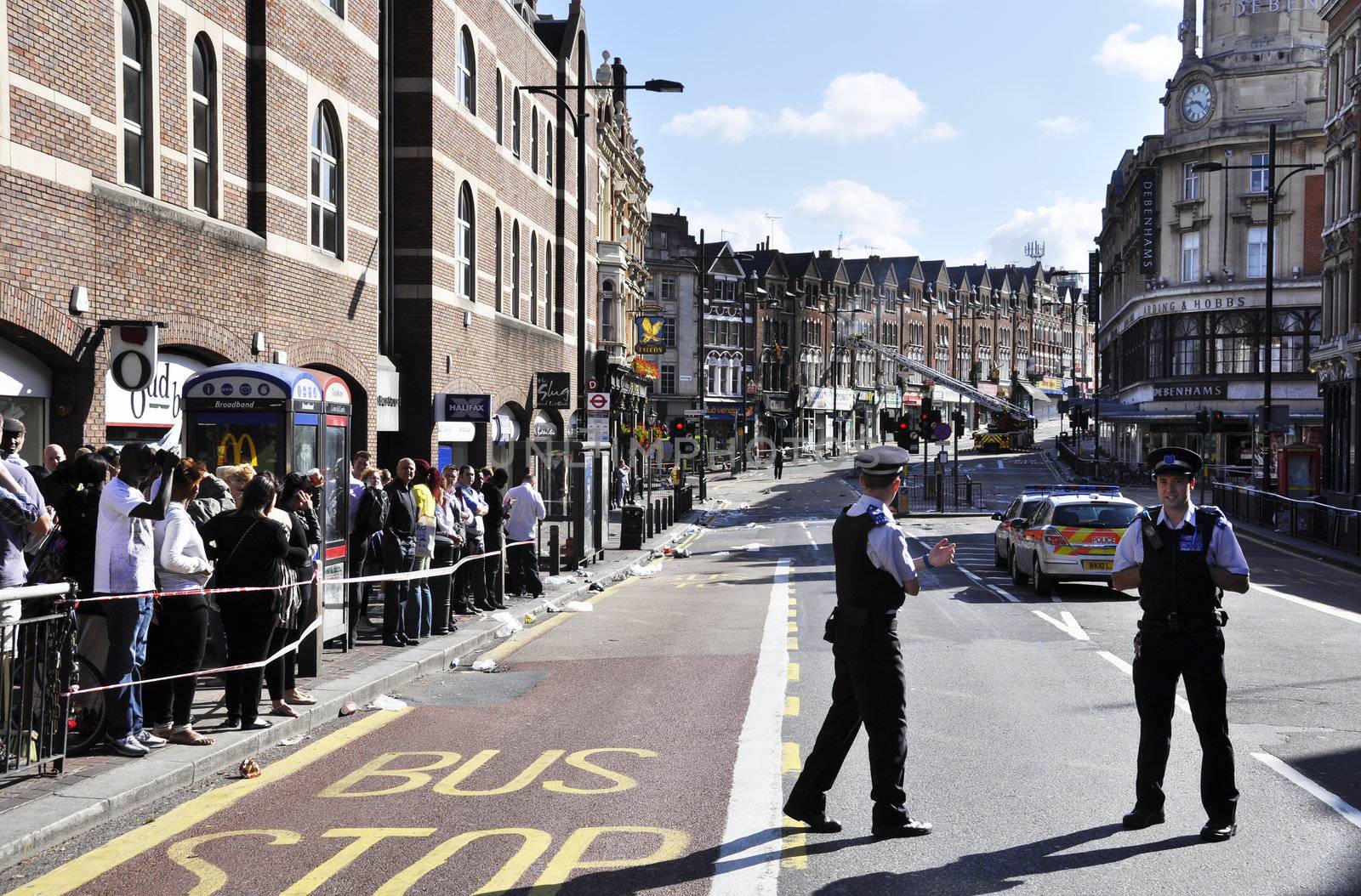 LONDON - AUGUST 09: Clapham Junction area is sacked after the third night of riots, on August 09, 2011 in London. Riots start spreading in London after Mark Duggan was shot dead by the police.