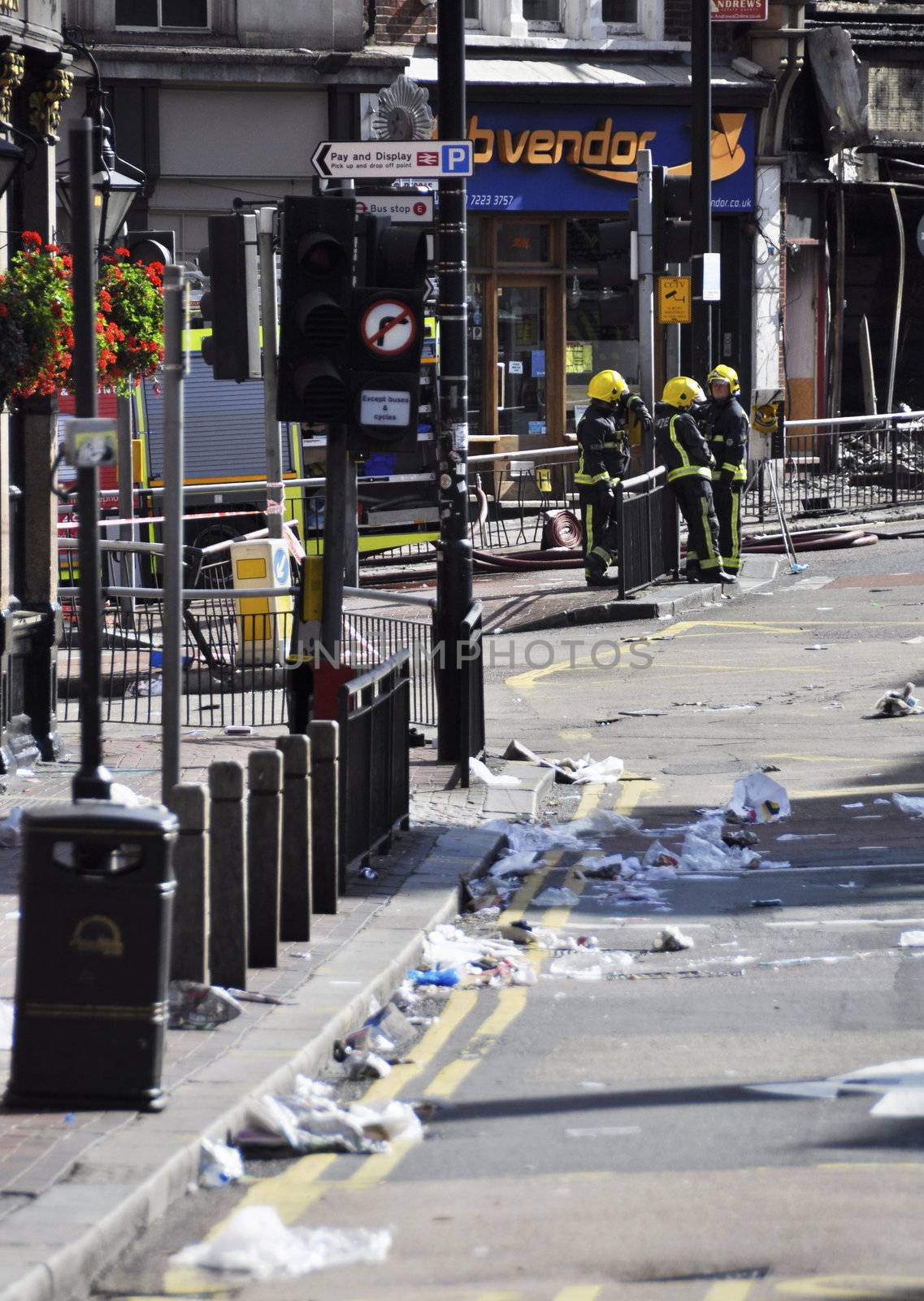 LONDON - AUGUST 09: Clapham Junction area is sacked after the third night of riots, on August 09, 2011 in London. Riots start spreading in London after Mark Duggan was shot dead by the police.