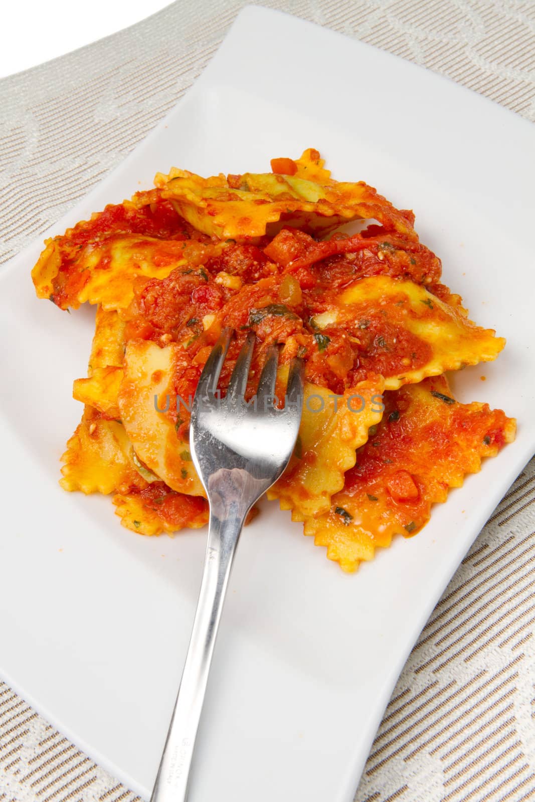 italian ravioli with red tomaotes sauce