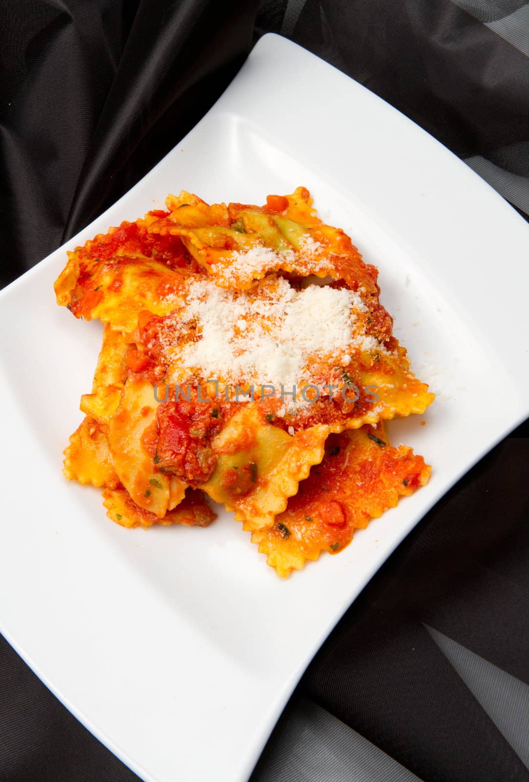 italian ravioli with red tomaotes sauce