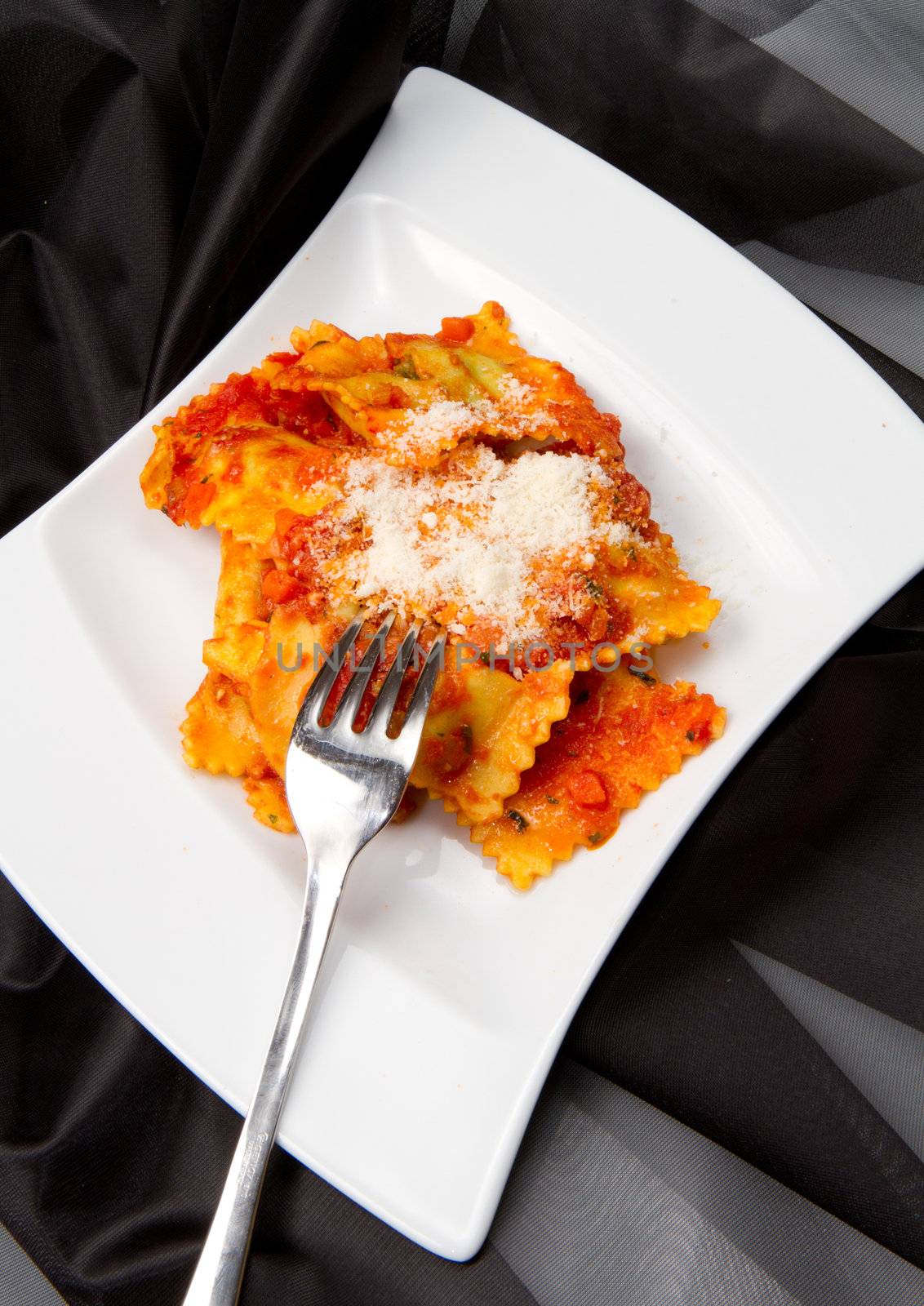 italian ravioli with red tomaotes sauce