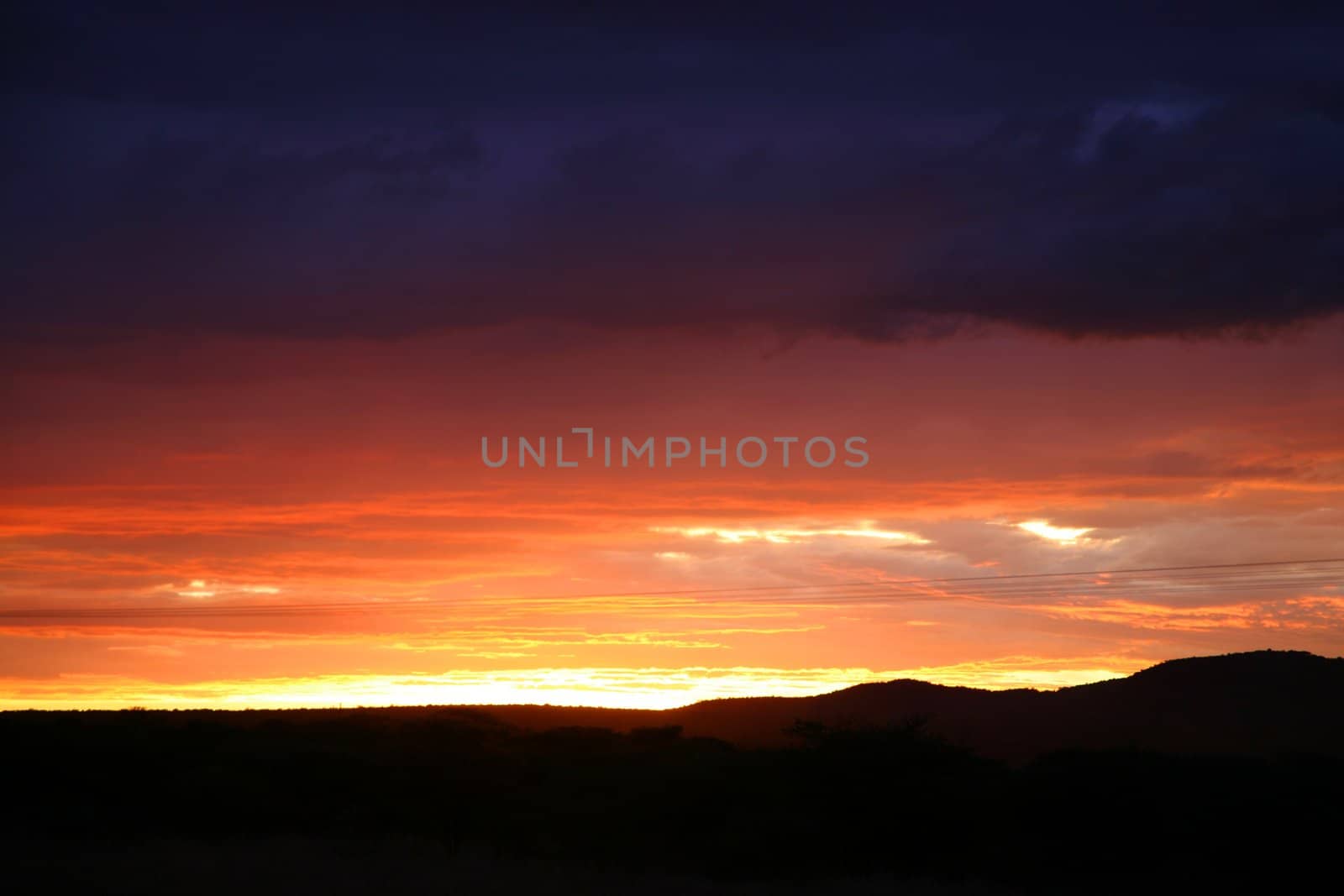 Sunset over the wide rural african landscape in Namibia, South West Africa.