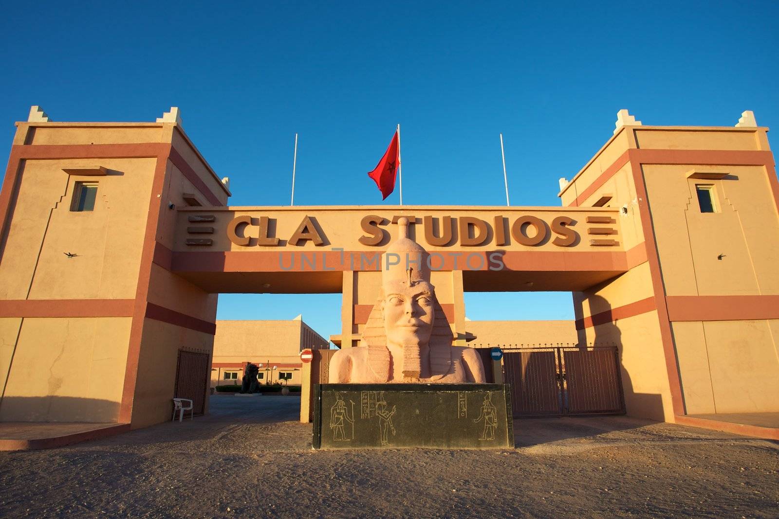 Entrance to the local Moroccan movie industry in Ouarzazate in Morocco with a blue sky and a perfect light