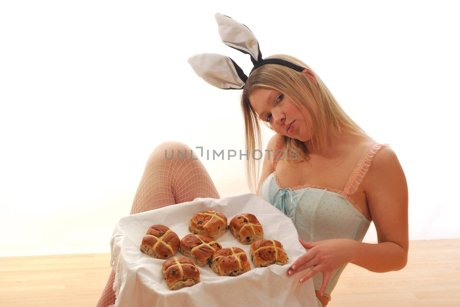 Bunny Girl sitting with Hot cross buns