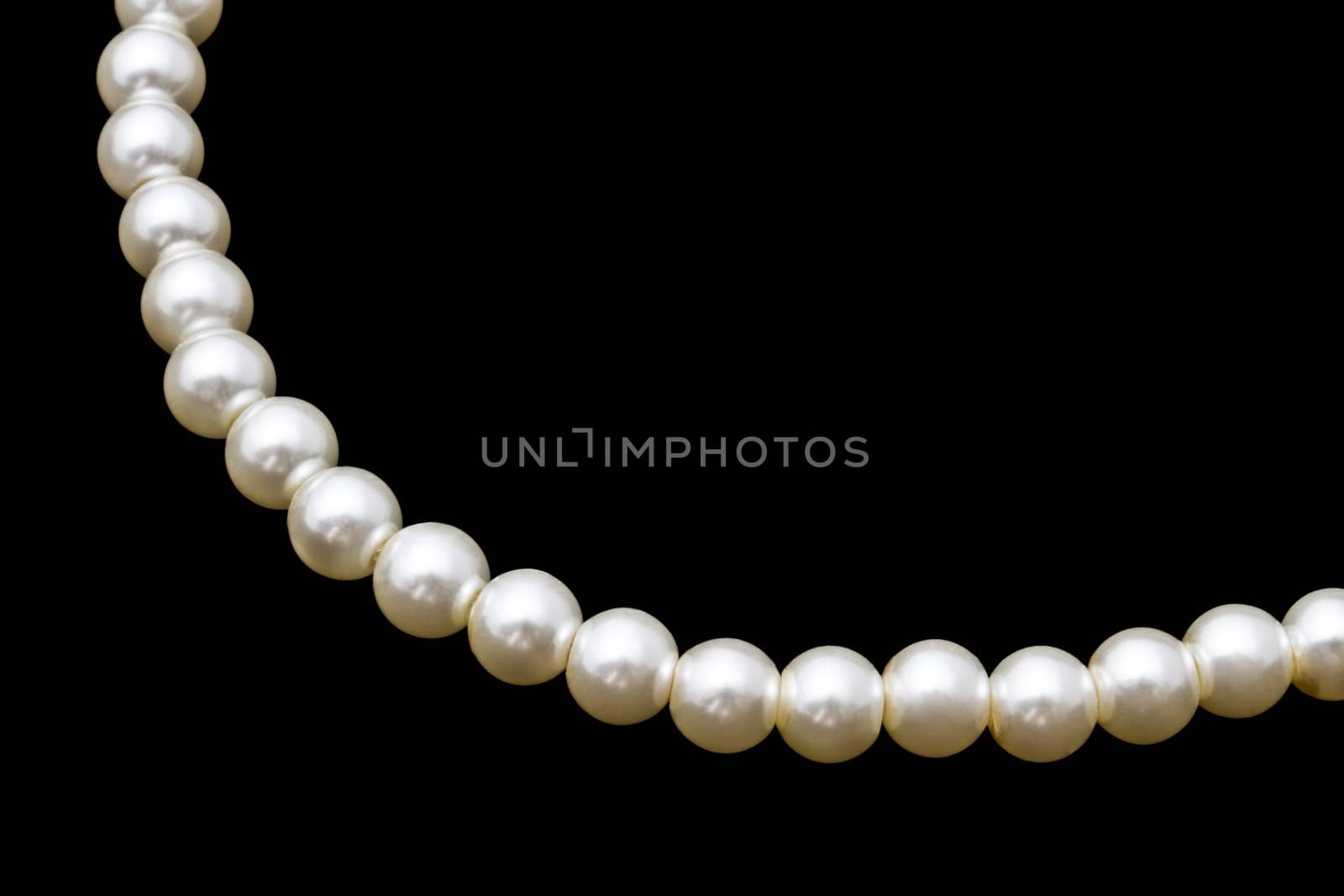 White Pearl Necklace isolated on black background
