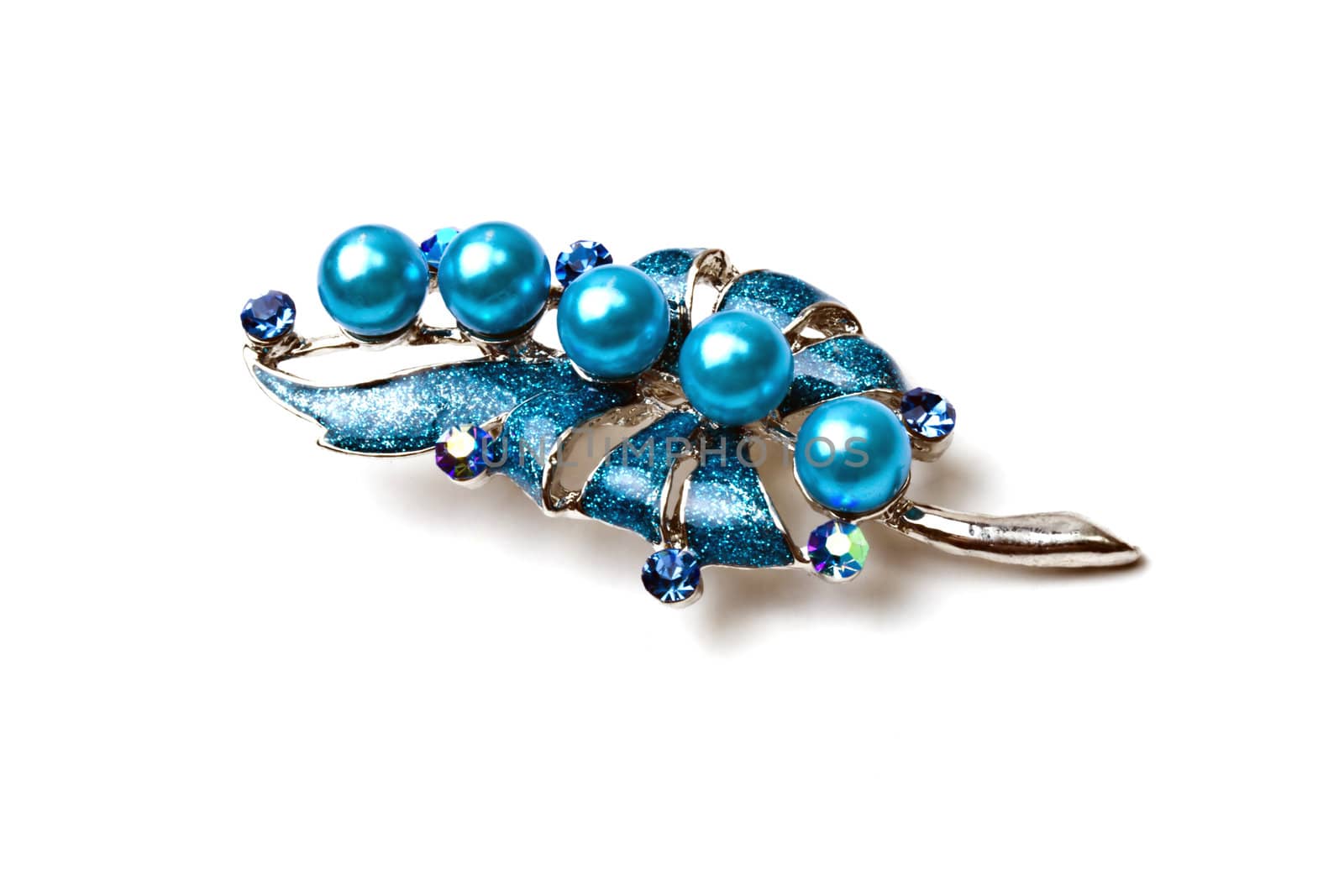 Beautiful blue brooch isolated on white by ibphoto