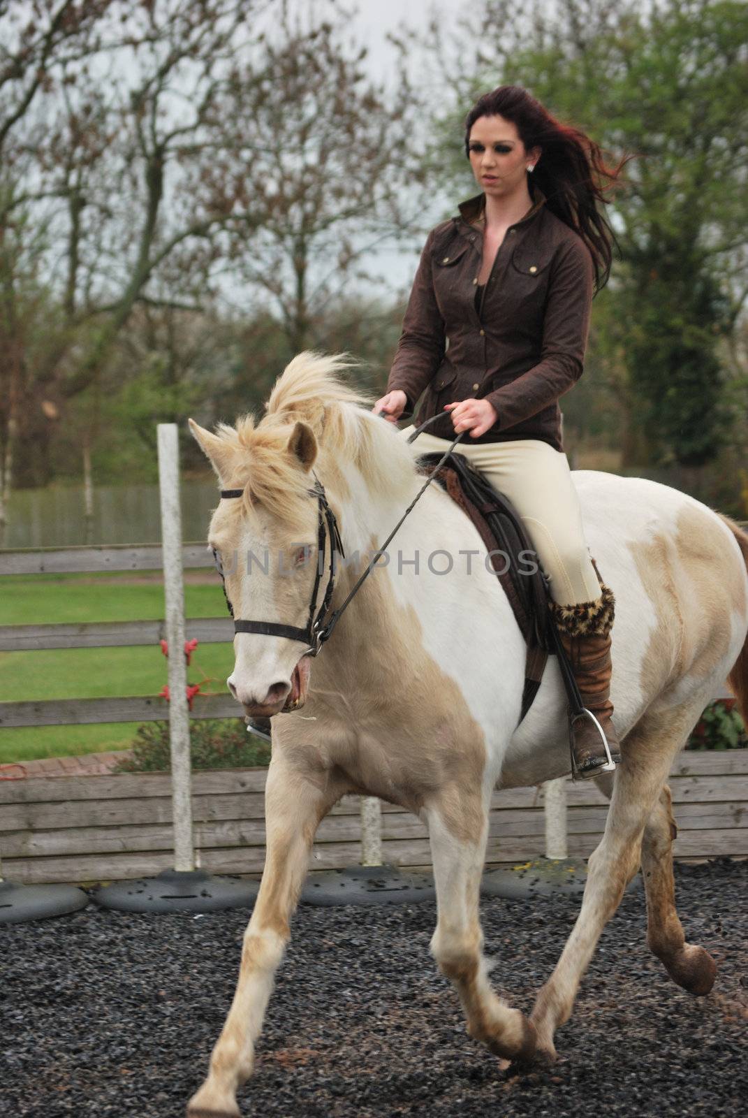 pretty girl riding horse