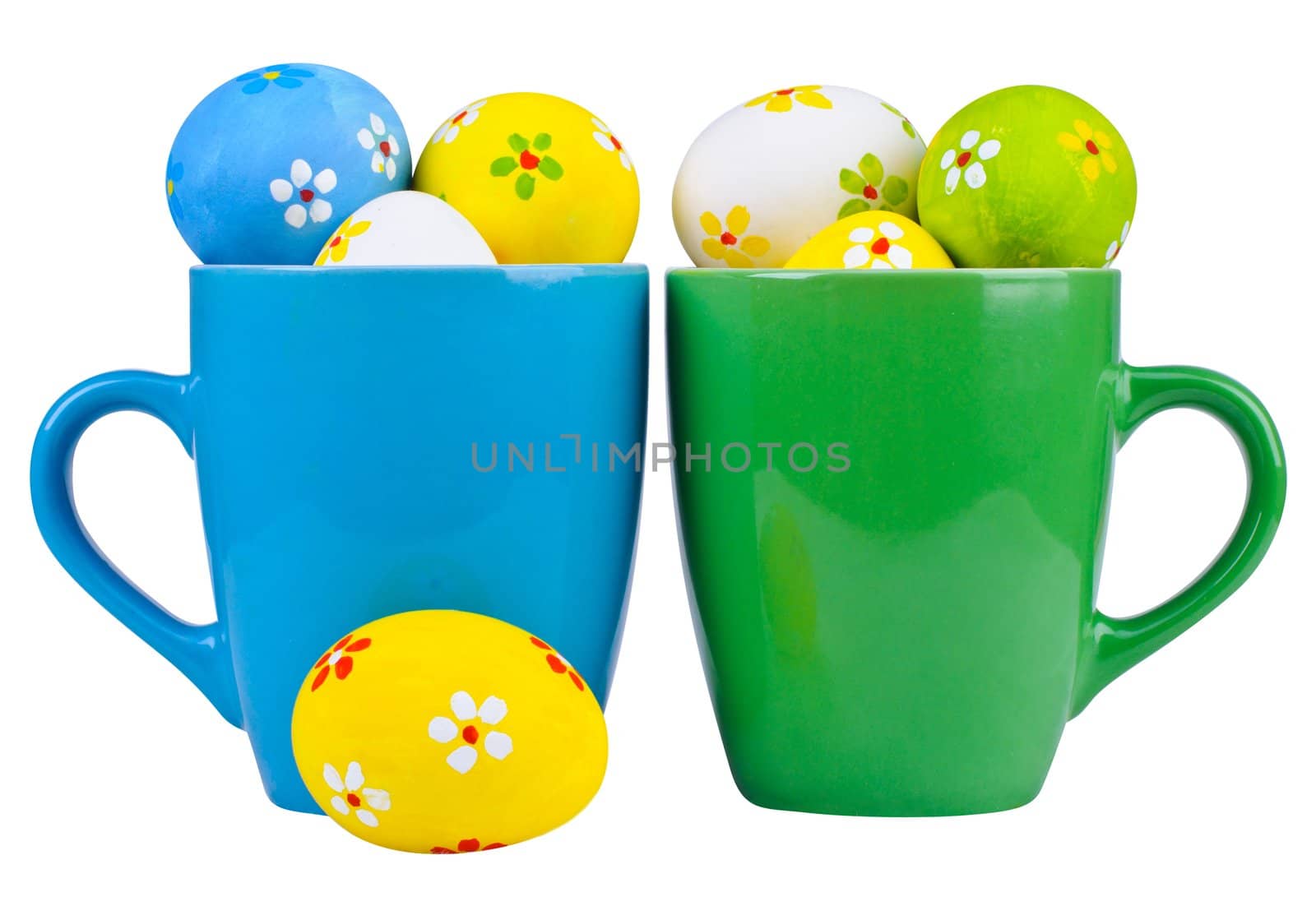 Easter eggs in cups on white background by maxoliki