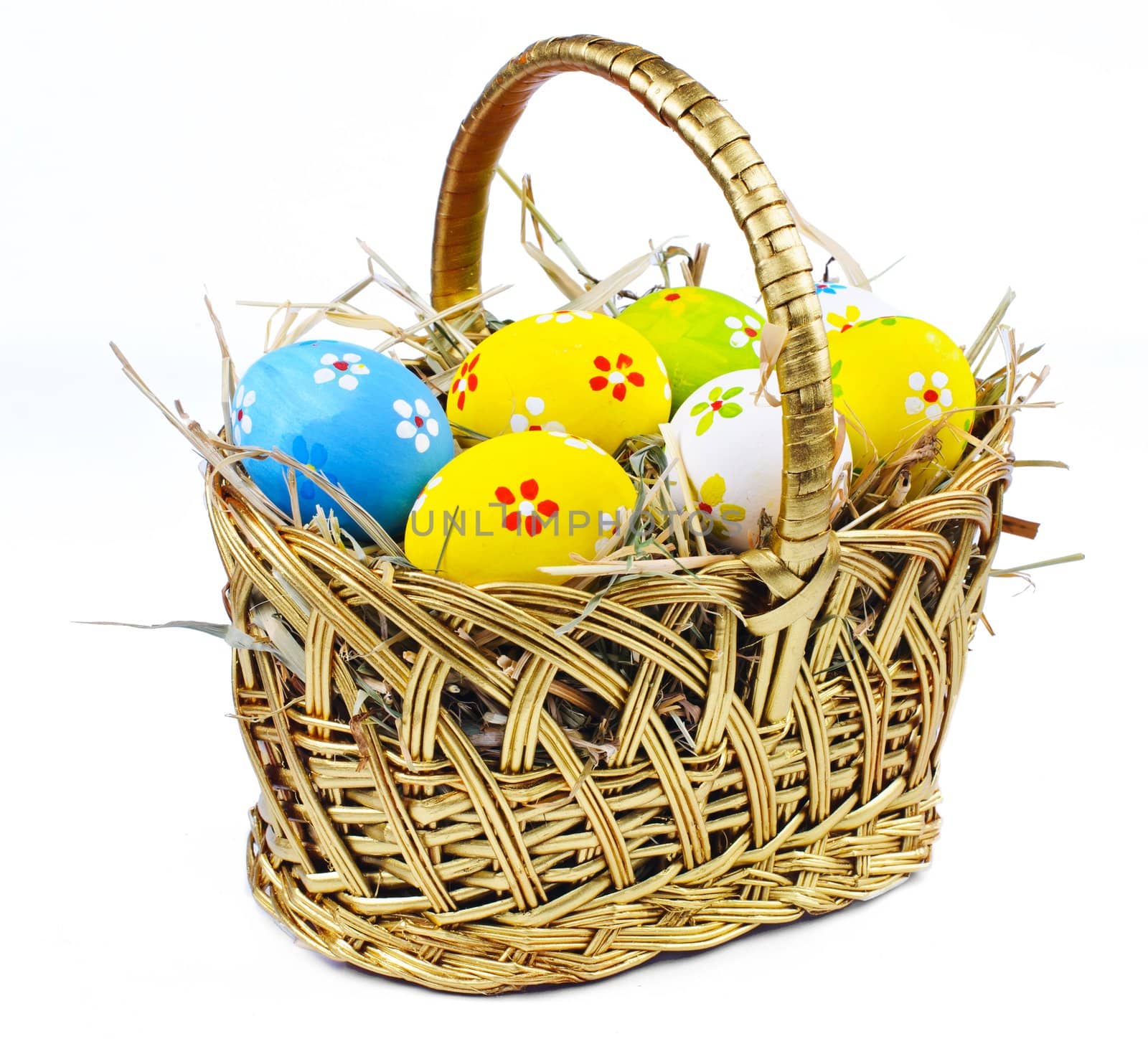 Closeup basket with colorful Easter Eggs by maxoliki