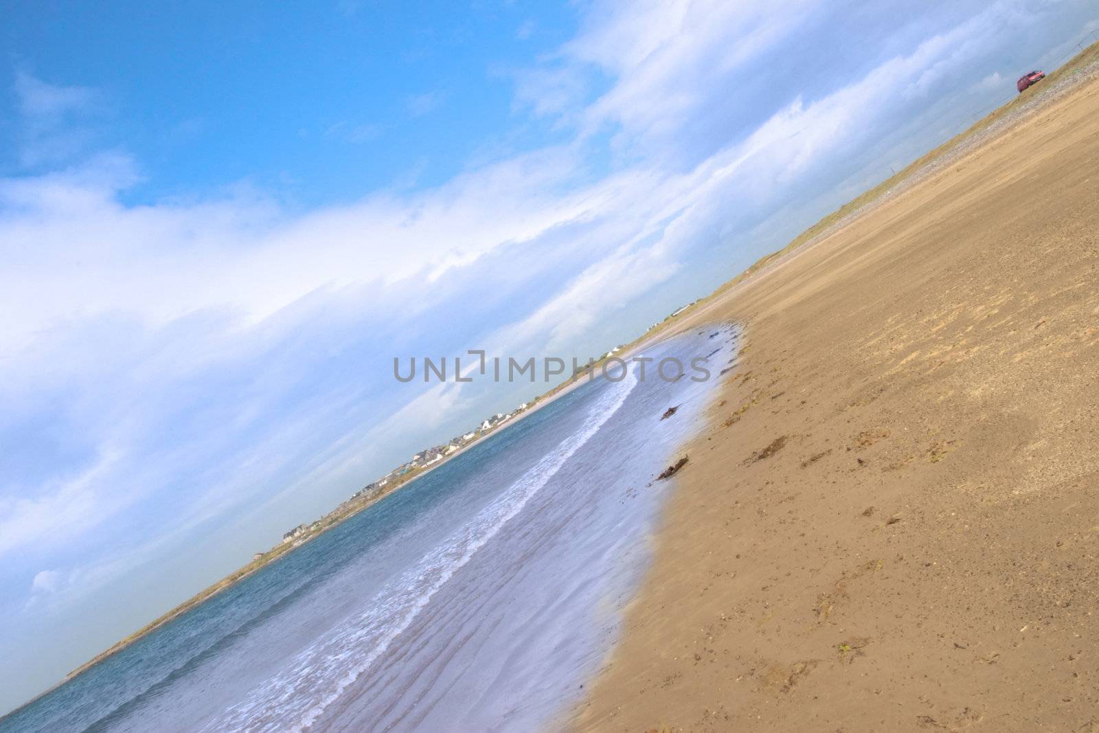 golden beach with blue sky and clouds in the maharees on the Dingle Peninsula Ireland