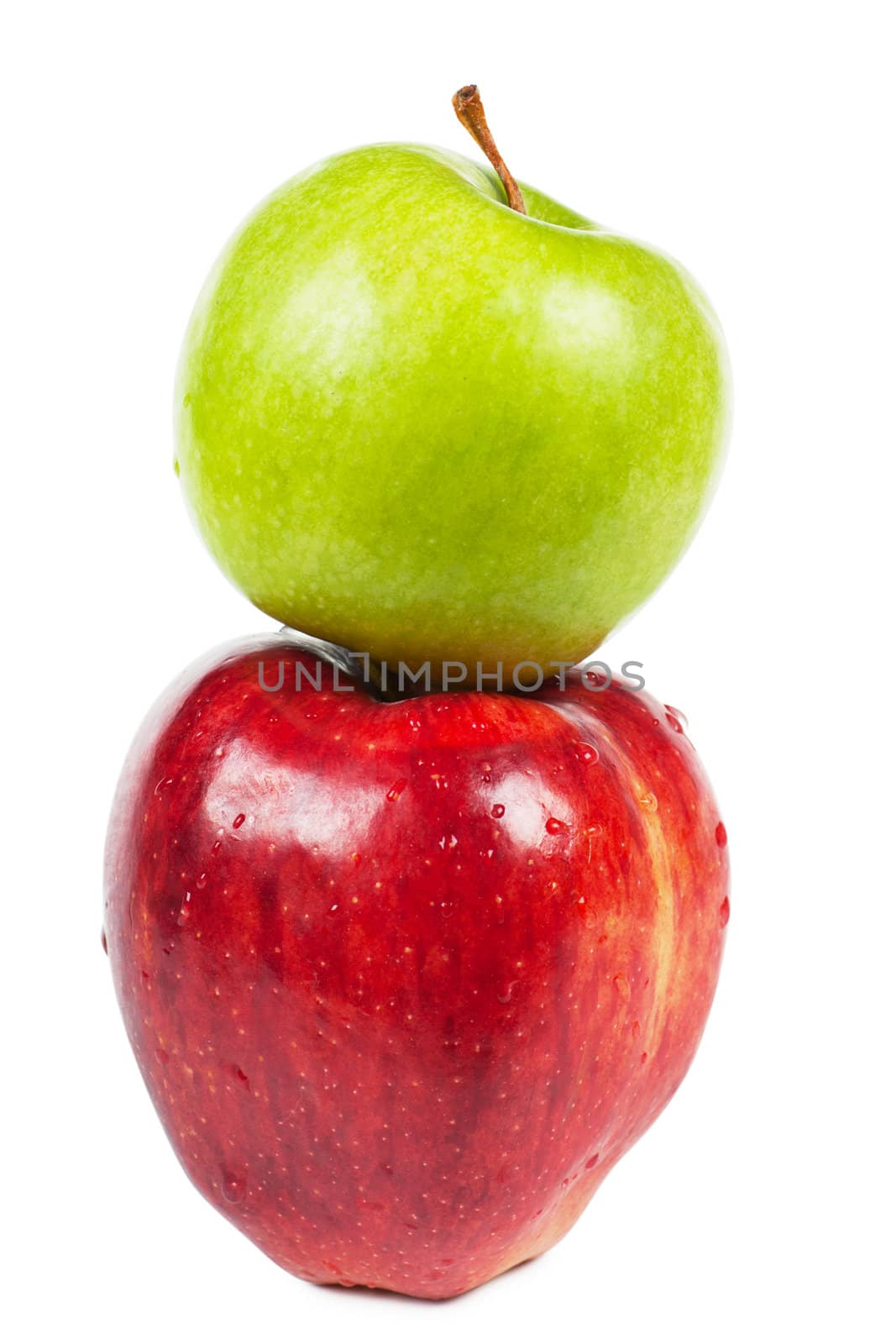 Two apples (red and green) isolated over white background