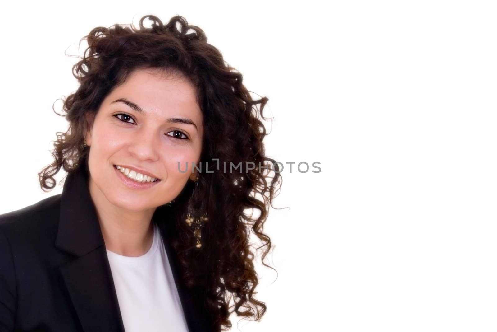 Portrait of beautiful brunette woman smiling.