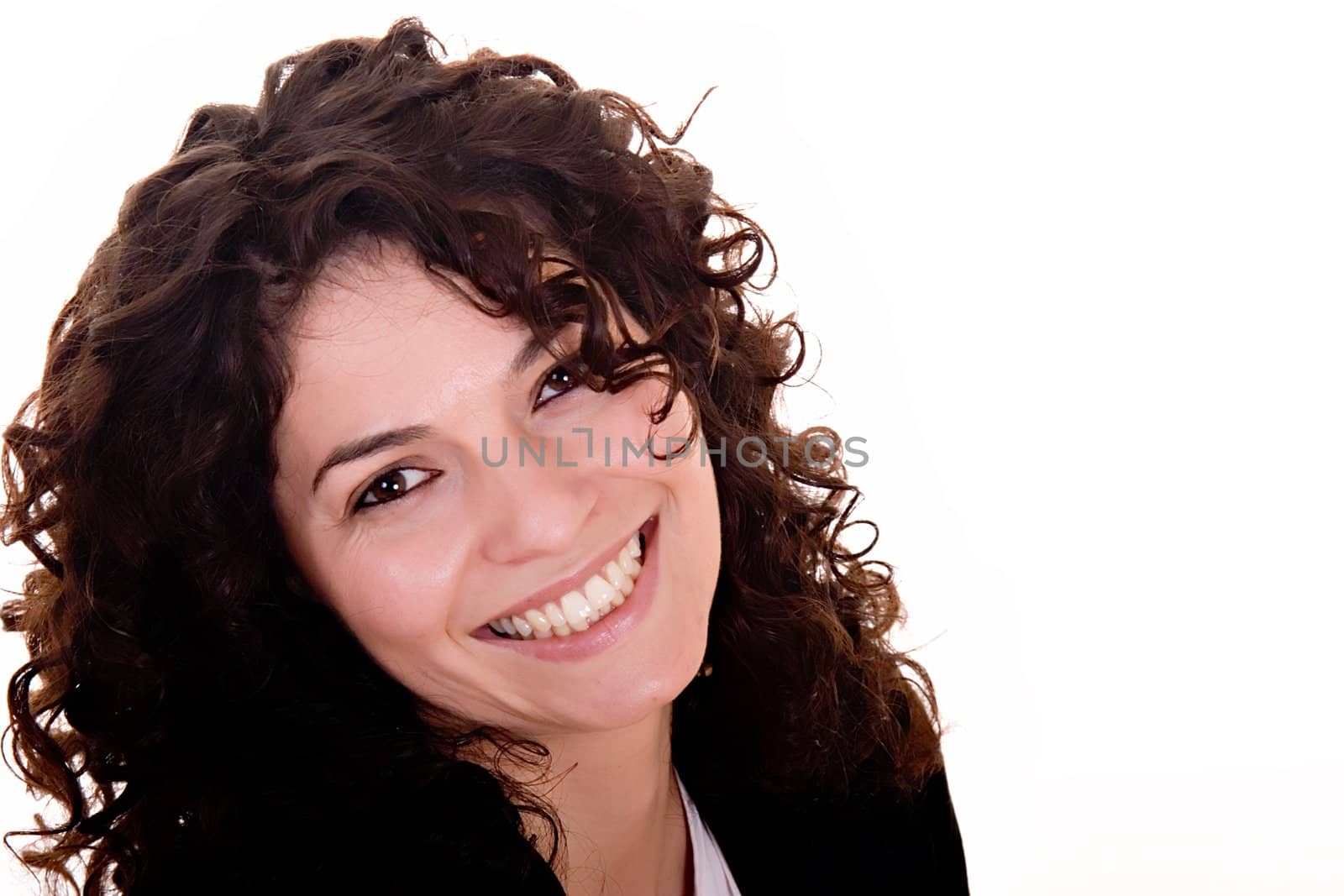 Portrait of beautiful brunette woman smiling.