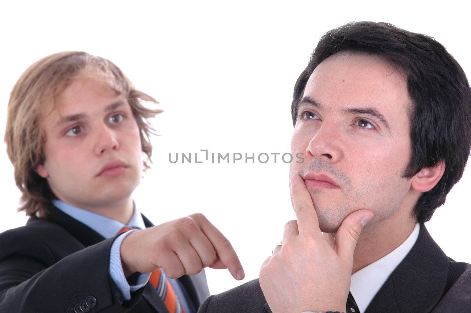 two young business men portrait on white. focus on the man of the right