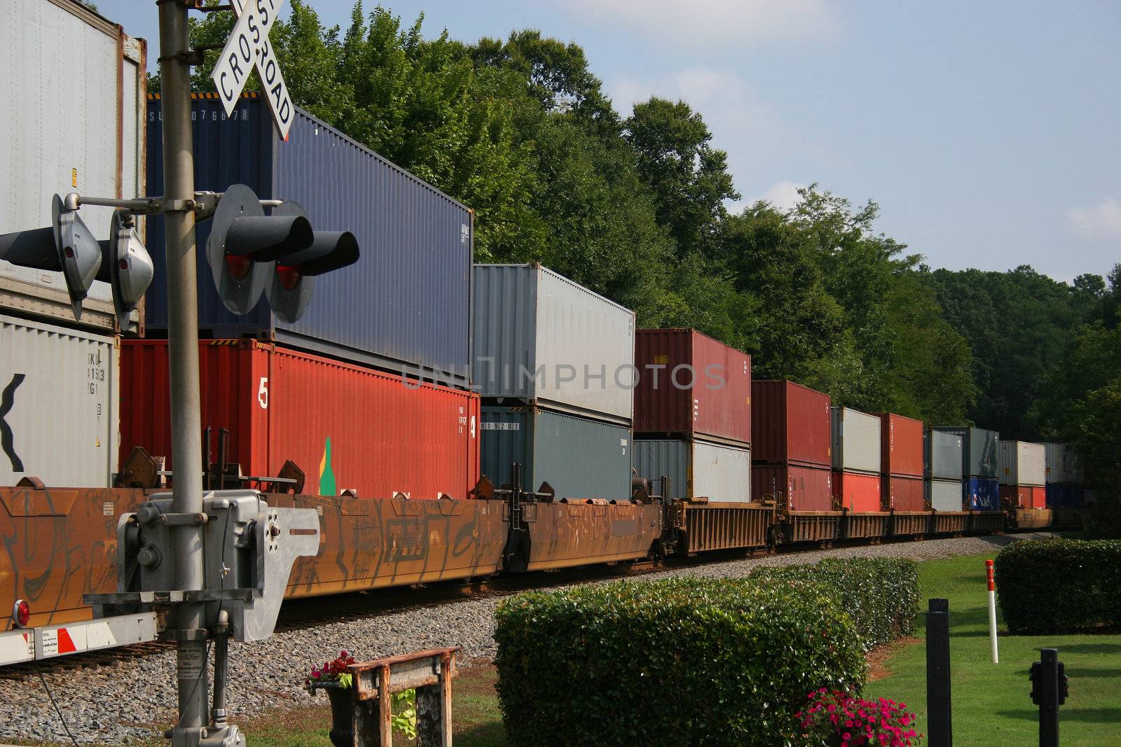 Freight Train across railroad crossing