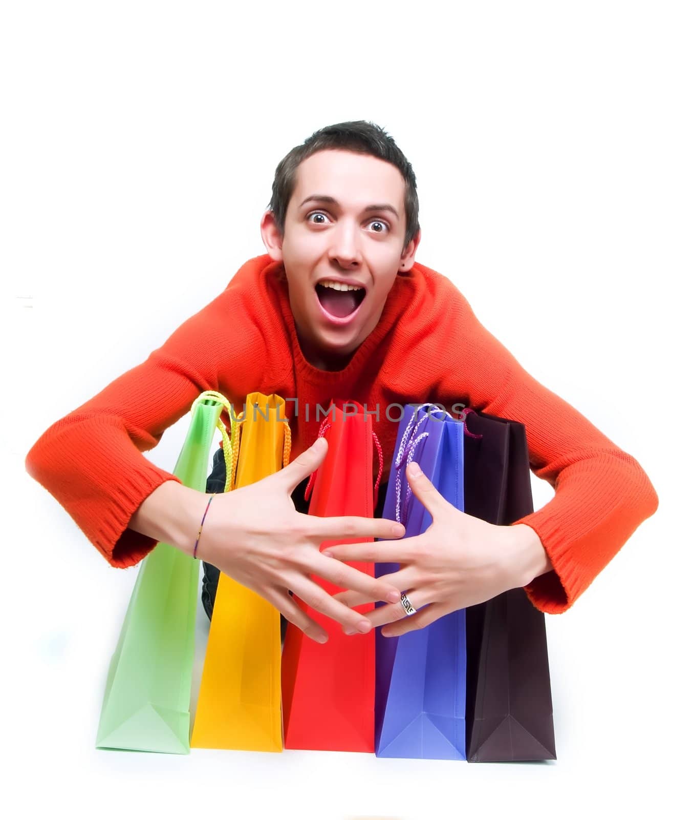 Young man holding shopping bags