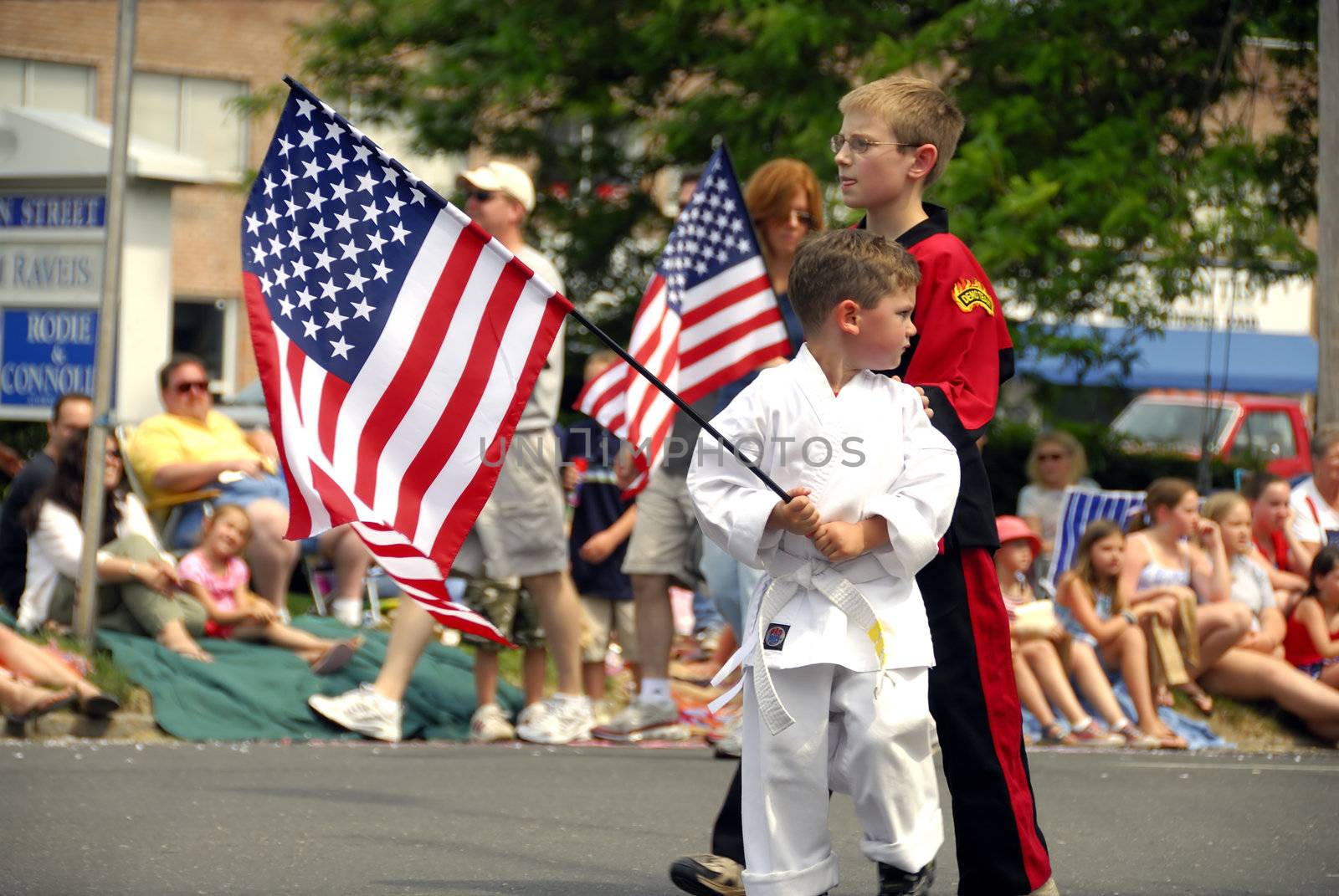 A group of kids walking in the memorial day parade