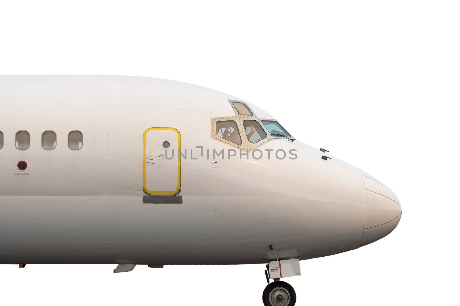 Close up of the cockpit and exit door of a commercial jetliner isolated on white