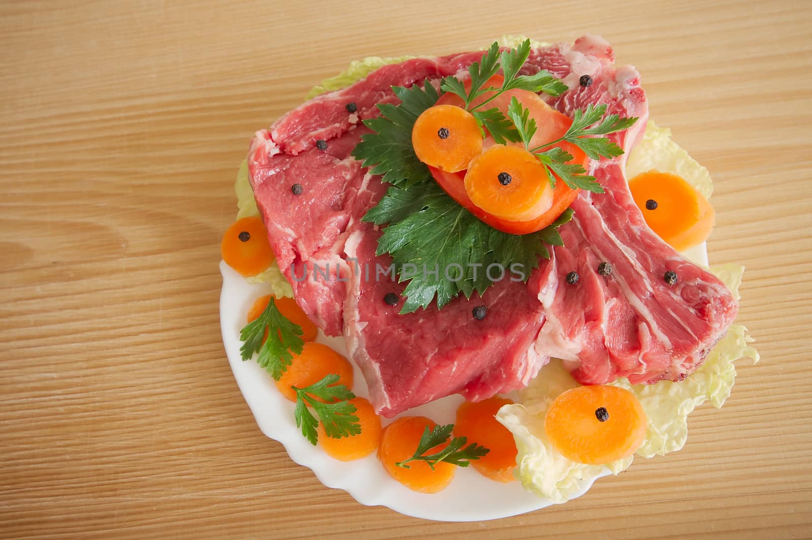 Pork meat decorated with vegetables