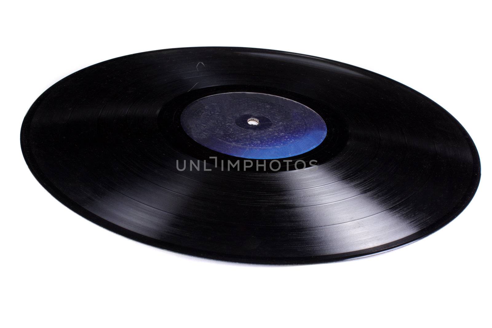 An old gramophone record, isolated on white studio background.