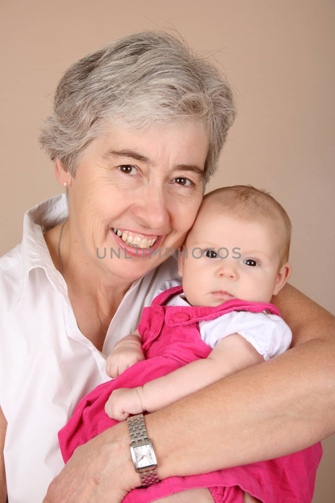 Portrait of a grandmother and her two month old grandaughter