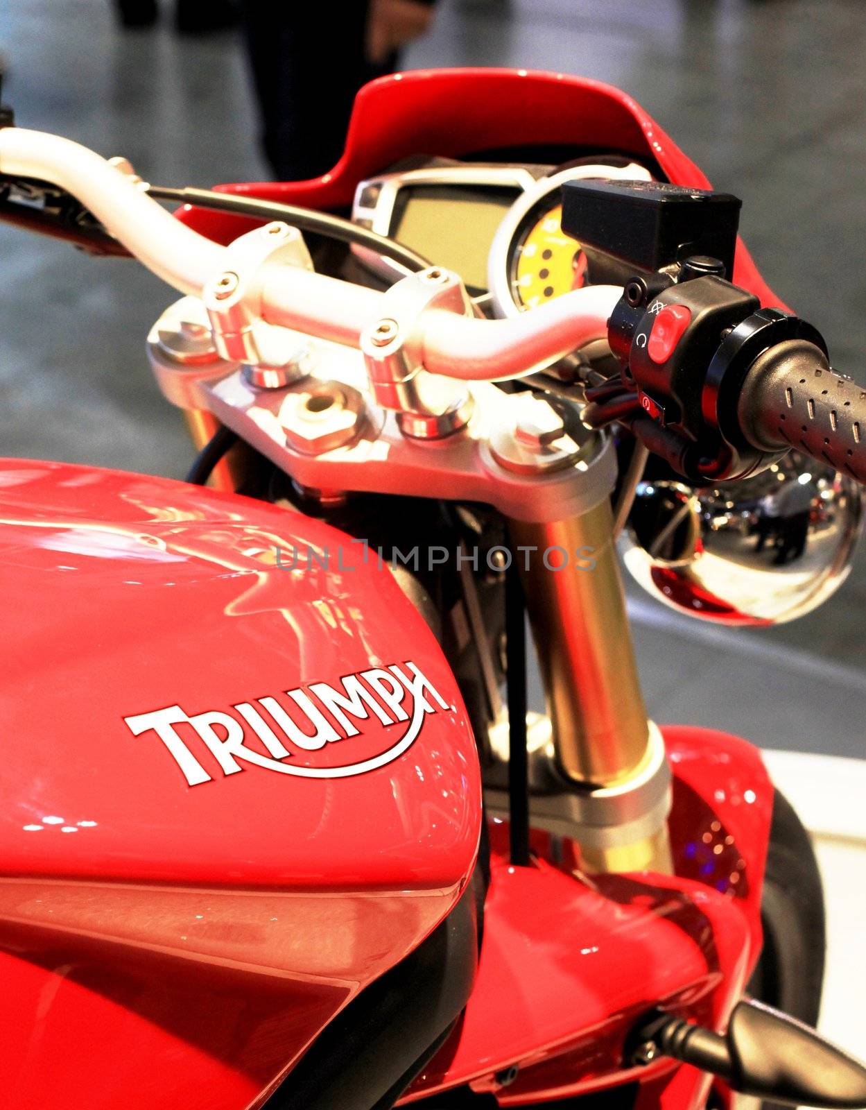 Triumph motorcycle in exhibition at EICMA, International Motorcycle Exhibition in Milan, Italy.